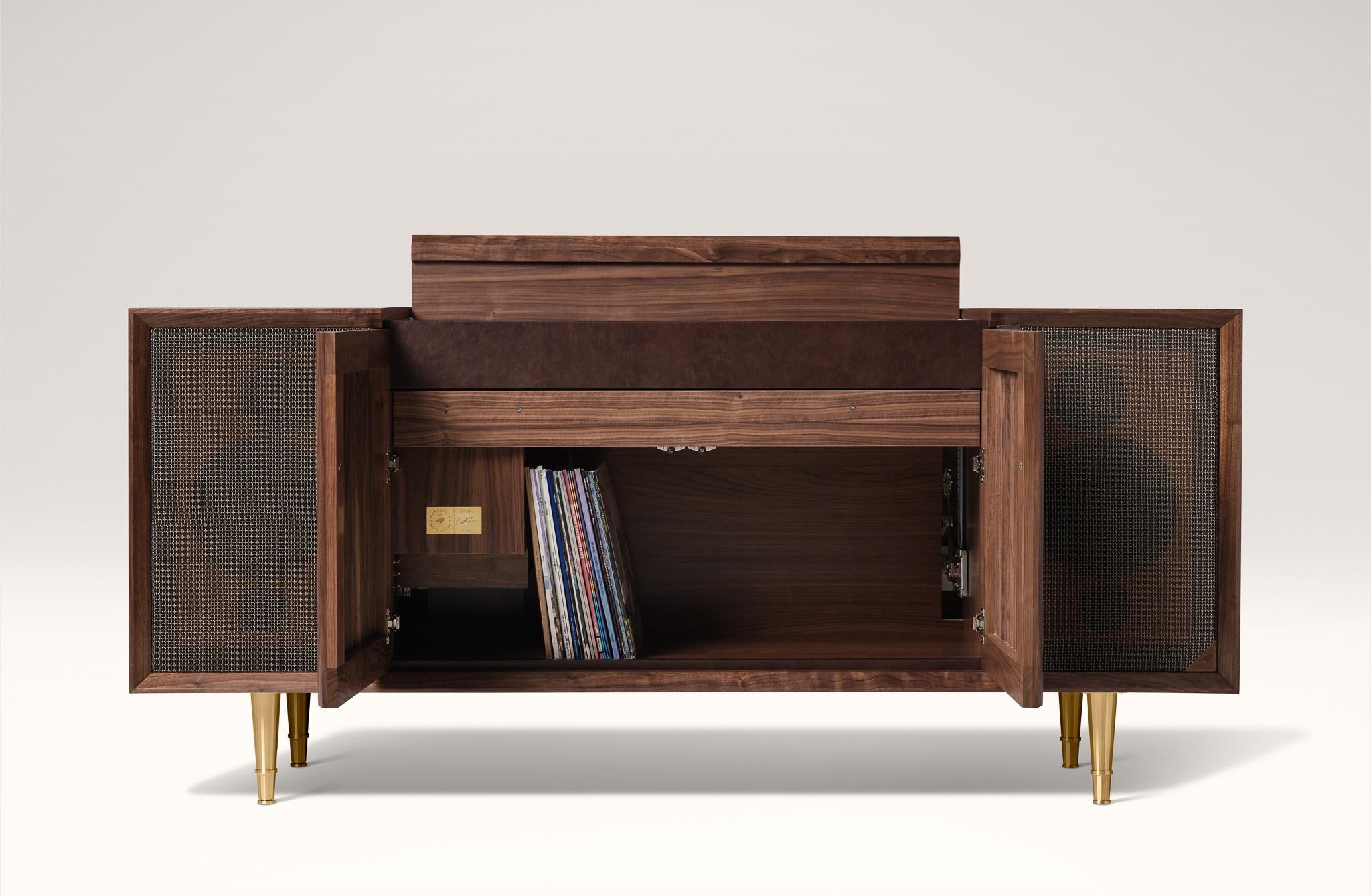 https://a.1stdibscdn.com/wrensilva-m1-record-player-console-in-natural-walnut-brass-for-sale-picture-4/f_105212/f_459646921753475081732/Copy_of_M1_Walnut_Open_storage_metal_speaker_LESS_WOOD_ON_SPEAKER_master.jpg