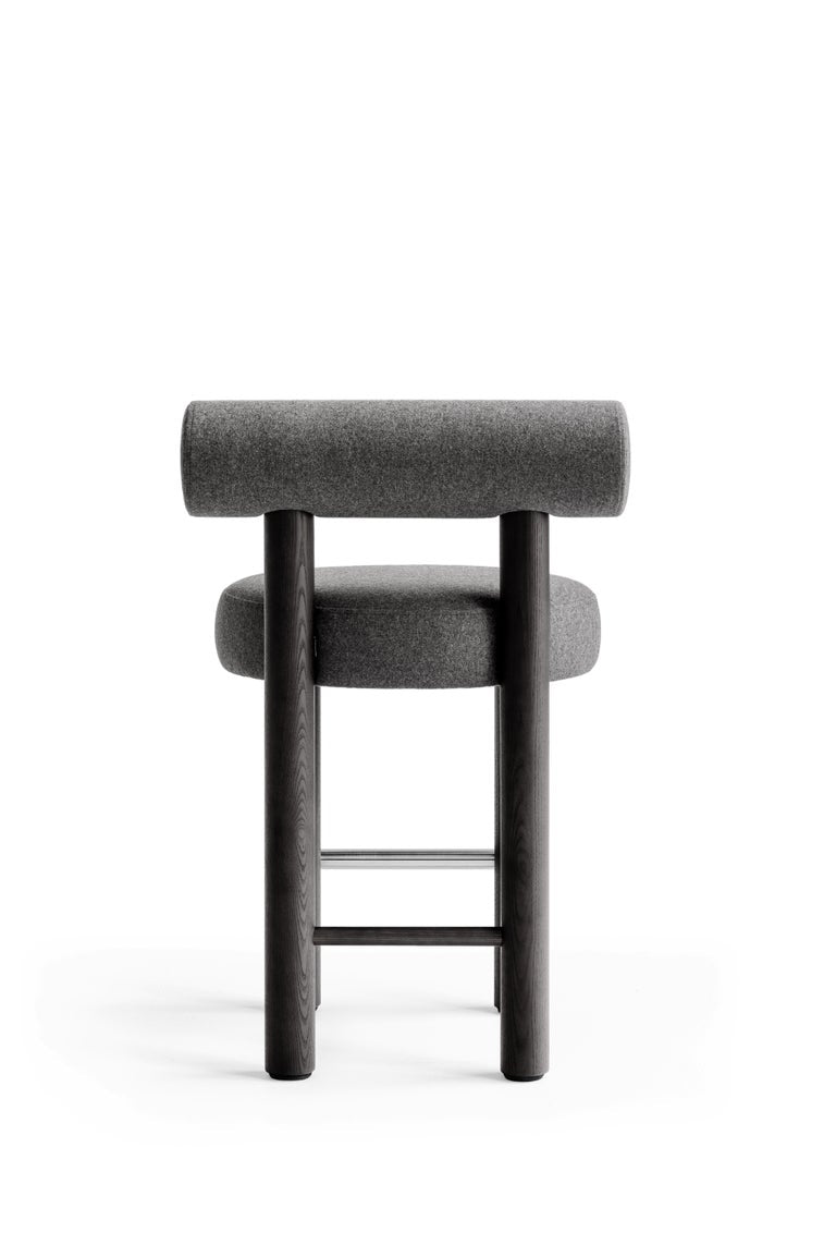https://a.1stdibscdn.com/modern-counter-chair-gropius-cs2-in-various-fabric-with-wooden-legs-by-noom-for-sale-picture-3/f_42321/f_371894721700580655501/Counter_Chair_Gropius_CS2_11_black_master.jpg?width=768