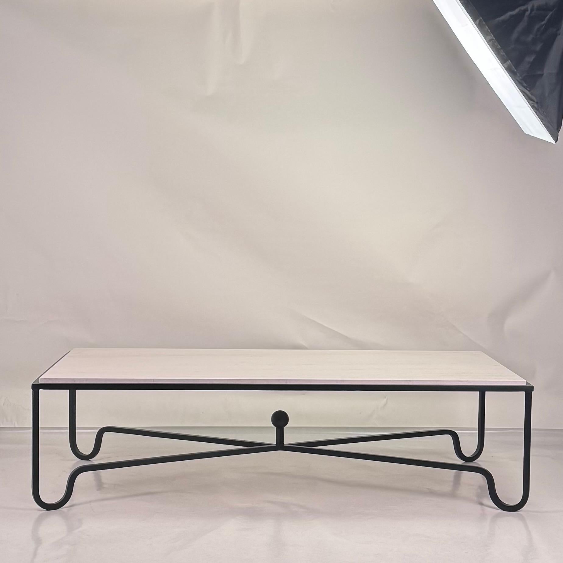 https://a.1stdibscdn.com/large-cream-limestone-entretoise-coffee-table-by-design-freres-for-sale-picture-3/f_8184/f_486116321769975387709/CreamLimestoneEntretoise_1_master.jpg