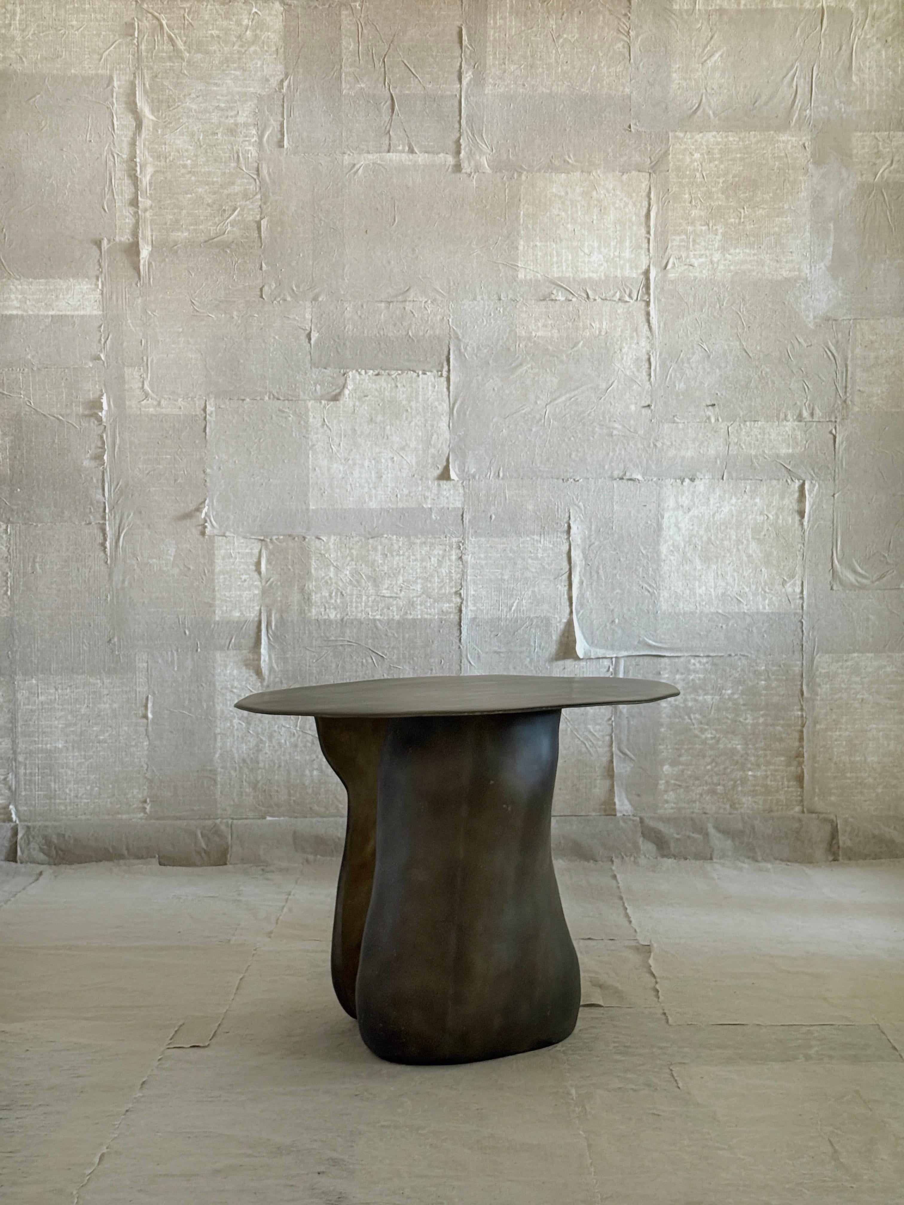 https://a.1stdibscdn.com/moss-brown-formless-fiberglass-round-table-by-kar-for-sale-picture-5/f_12192/f_476237721763592759239/D3D872D4_0693_475C_B4E8_84043582872D_2_master.jpg