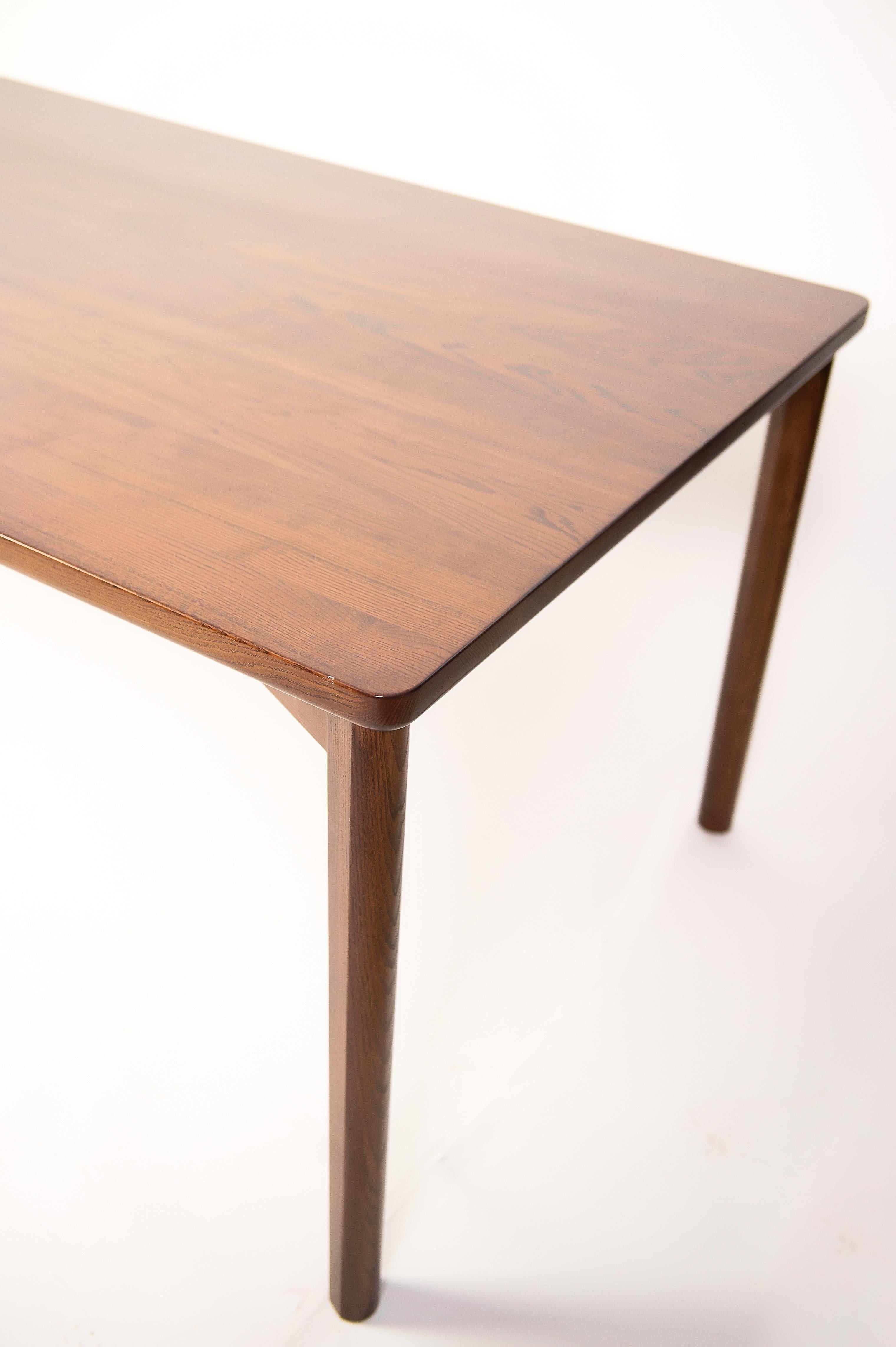 https://a.1stdibscdn.com/solana-dark-brown-solid-wood-dining-table-for-sale-picture-5/f_82682/f_330148521677525909107/D4S_9665_master.jpg