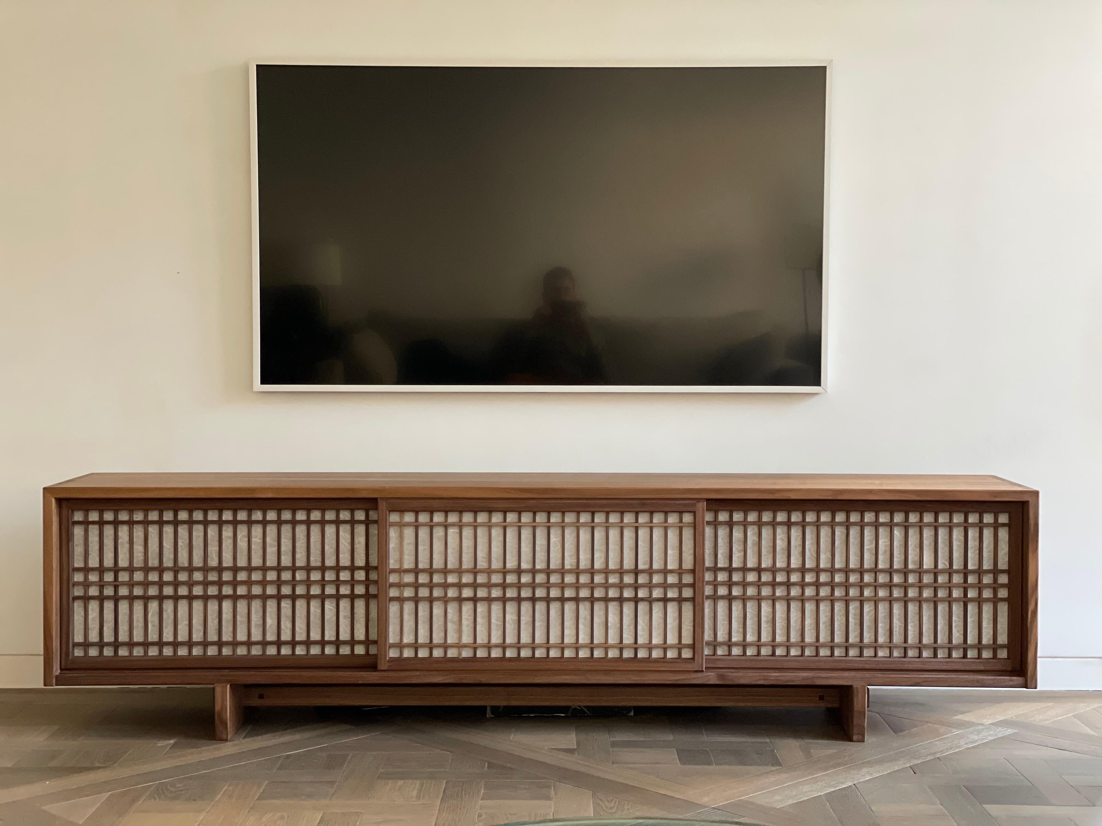 https://a.1stdibscdn.com/walnut-media-console-room-divider-with-sliding-shoji-doors-for-sale-picture-3/f_45782/f_227077621614352126140/D5B7C47A_A286_41A6_9EEE_768B5C642C8B_master.jpeg