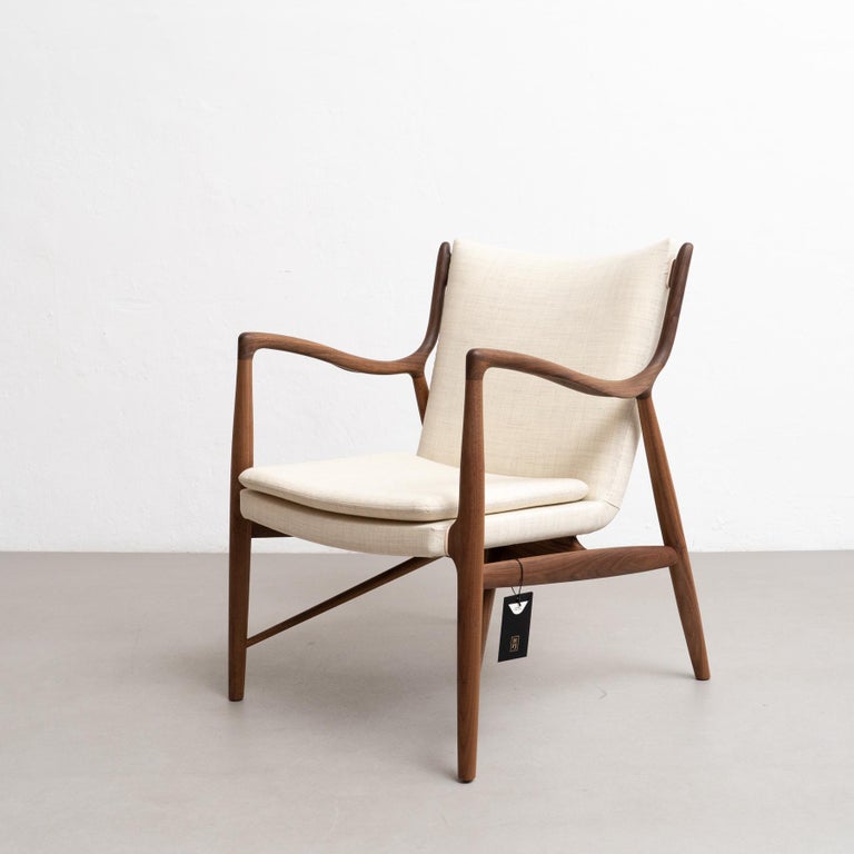 https://a.1stdibscdn.com/finn-juhl-45-chair-wood-and-fabric-for-sale-picture-2/f_14272/f_387727821710009576593/DADA27022024_199_master.jpg?width=768