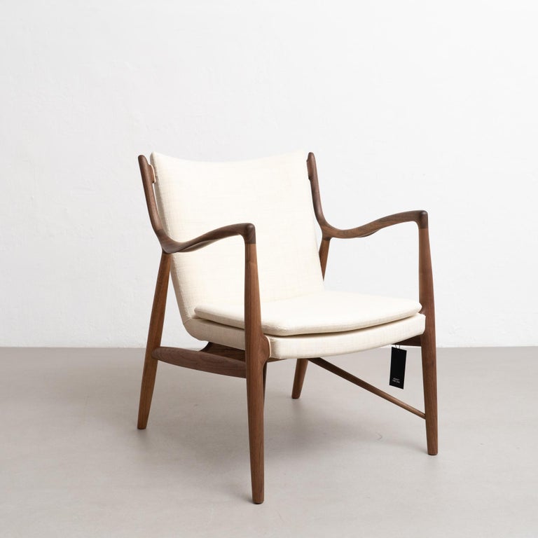 https://a.1stdibscdn.com/finn-juhl-45-chair-wood-and-fabric-for-sale-picture-4/f_14272/f_387727821710009576556/DADA27022024_201_master.jpg?width=768