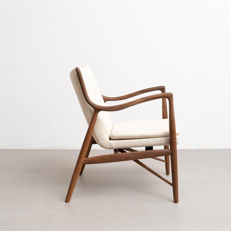https://a.1stdibscdn.com/finn-juhl-45-chair-wood-and-fabric-for-sale-picture-5/f_14272/f_387727821710009576592/DADA27022024_202_master.jpg?width=768