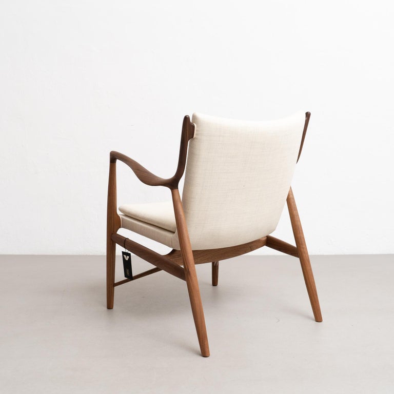 https://a.1stdibscdn.com/finn-juhl-45-chair-wood-and-fabric-for-sale-picture-8/f_14272/f_387727821710009578116/DADA27022024_205_master.jpg?width=768