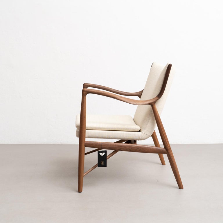https://a.1stdibscdn.com/finn-juhl-45-chair-wood-and-fabric-for-sale-picture-9/f_14272/f_387727821710009578125/DADA27022024_206_master.jpg?width=768