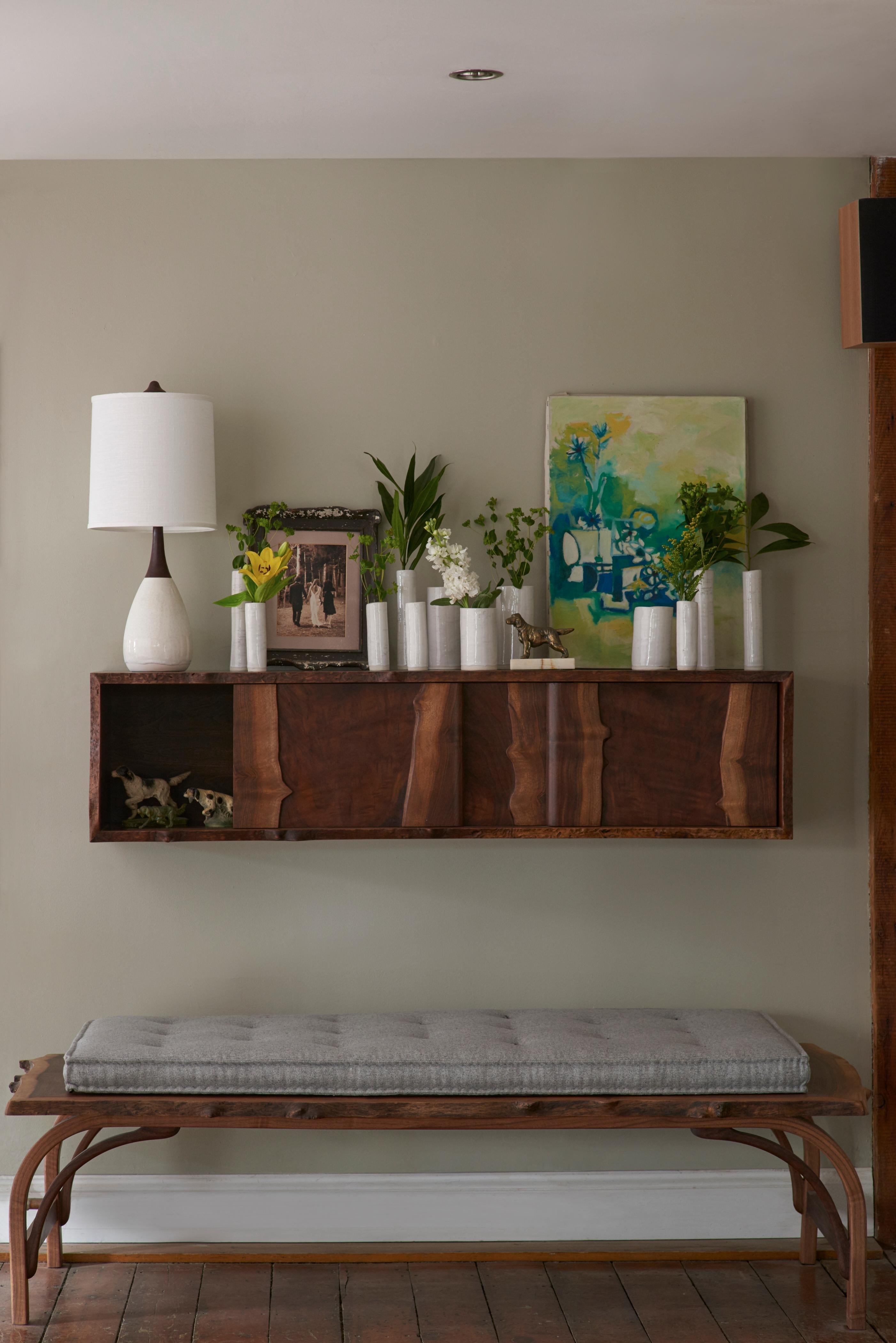 https://a.1stdibscdn.com/claro-walnut-live-edge-bentleg-bench-with-french-mattress-style-cushion-for-sale-picture-4/f_57872/f_250335521629834341621/DBO_Home_1_6_152077e_master.jpg