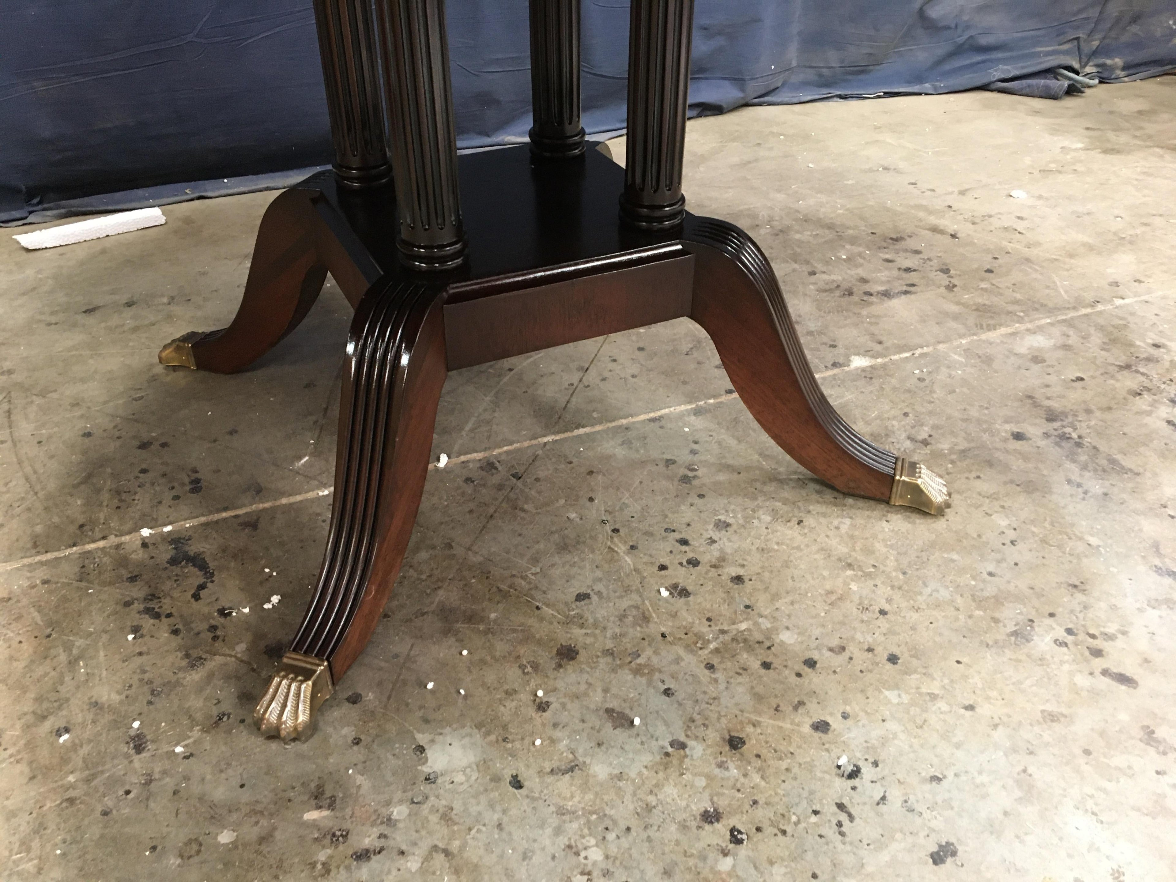 https://a.1stdibscdn.com/round-crotch-mahogany-georgian-style-pedestal-dining-table-by-leighton-hall-for-sale-picture-4/f_44162/f_235522621619554957932/DC41A0C6_DD83_4AE9_A2AB_00E41754D93F_master.jpeg