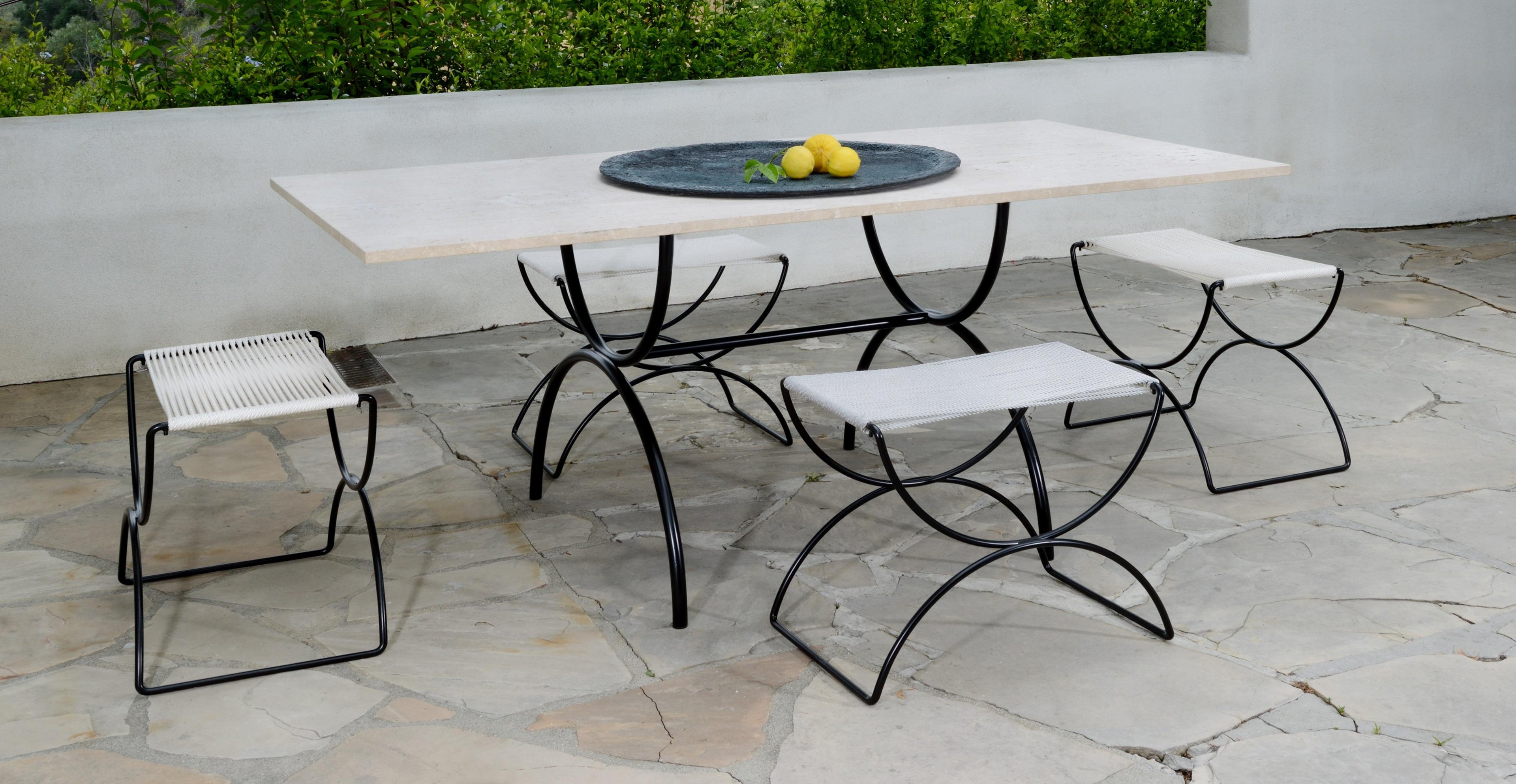 https://a.1stdibscdn.com/pompeii-outdoor-dining-table-stainless-steel-base-vein-cut-honed-travertine-top-for-sale-picture-6/f_57062/f_238481221726770050023/DCP_10ten_Pompeii_Table_and_Seats_4_copy_master.jpg
