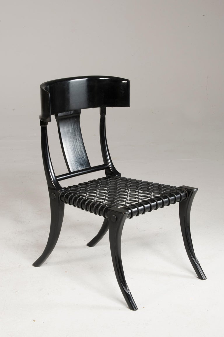 https://a.1stdibscdn.com/black-woven-leather-seat-walnut-saber-legs-klismos-chairs-customizable-for-sale-picture-2/f_20723/f_265407921639561342063/DDF_0622_master.jpg?width=768