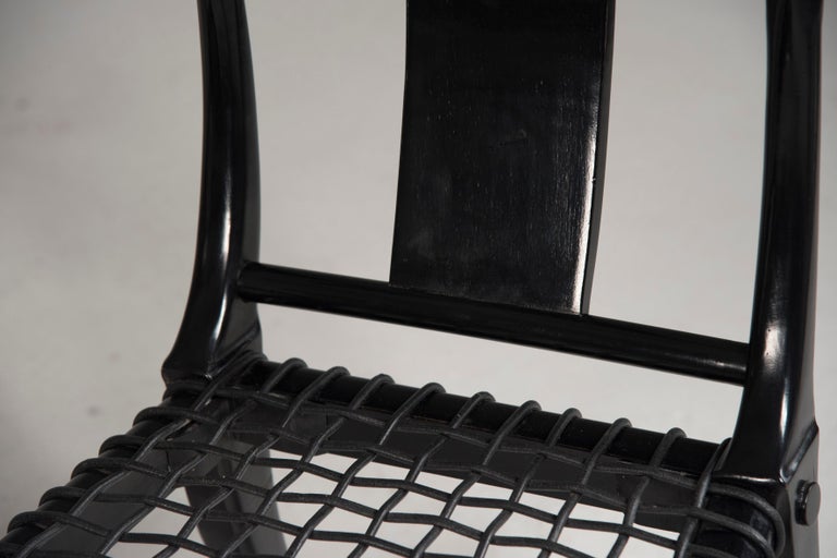 https://a.1stdibscdn.com/black-woven-leather-seat-walnut-saber-legs-klismos-chairs-customizable-for-sale-picture-7/f_20723/f_265407921639561342495/DDF_0634_master.jpg?width=768