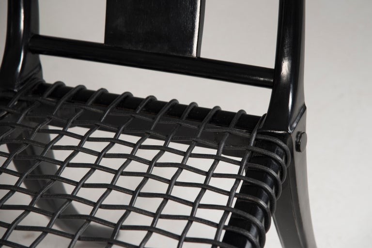 https://a.1stdibscdn.com/black-woven-leather-seat-walnut-saber-legs-klismos-chairs-customizable-for-sale-picture-8/f_20723/f_265407921639561352305/DDF_0635_master.jpg?width=768