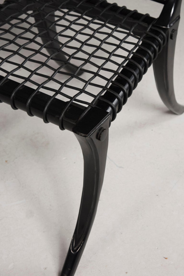 https://a.1stdibscdn.com/black-woven-leather-seat-walnut-saber-legs-klismos-chairs-customizable-for-sale-picture-9/f_20723/f_265407921639561352651/DDF_0636_master.jpg?width=768