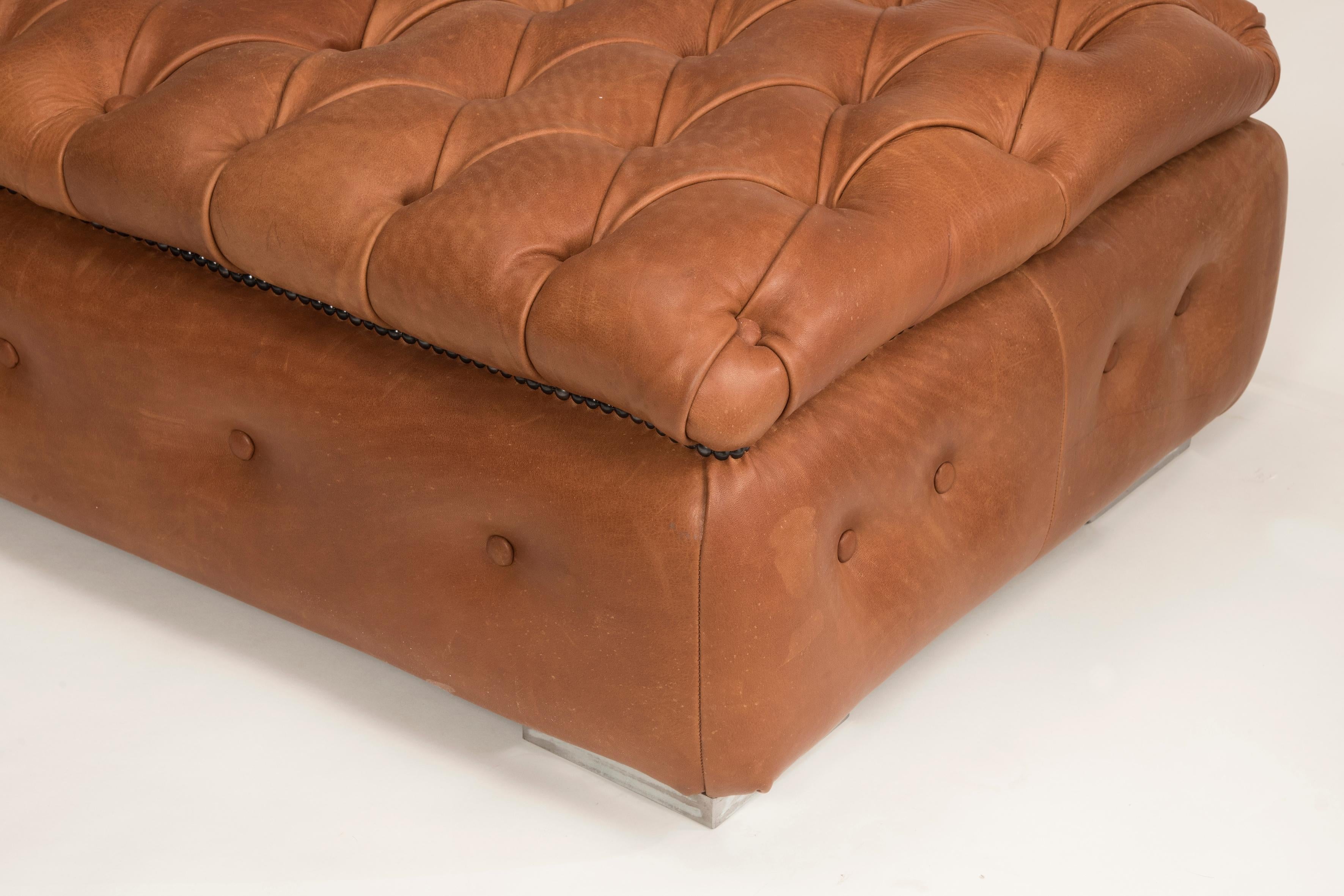 https://a.1stdibscdn.com/customizable-brown-leather-capitonne-pouf-available-in-other-colors-shape-size-for-sale-picture-6/f_20723/f_235188321619334229377/DDF_0790_1_master.jpg