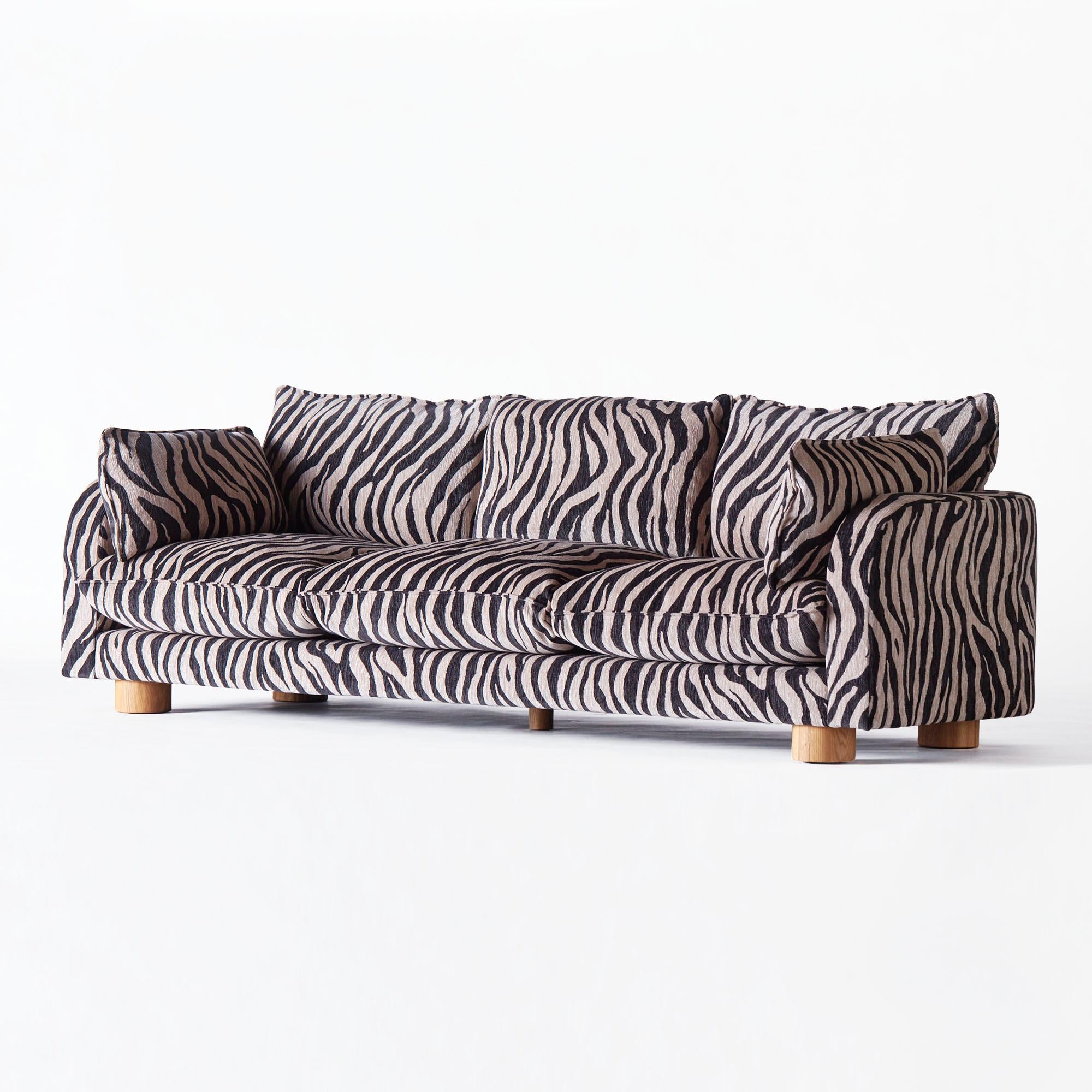https://a.1stdibscdn.com/zebra-patterned-upholstered-sofa-model-miles-for-sale-picture-3/f_58912/f_442125521771246864789/DD_2303_PRODUCT_SOFA_MILES_ZEBRA_1614_1__master.jpg