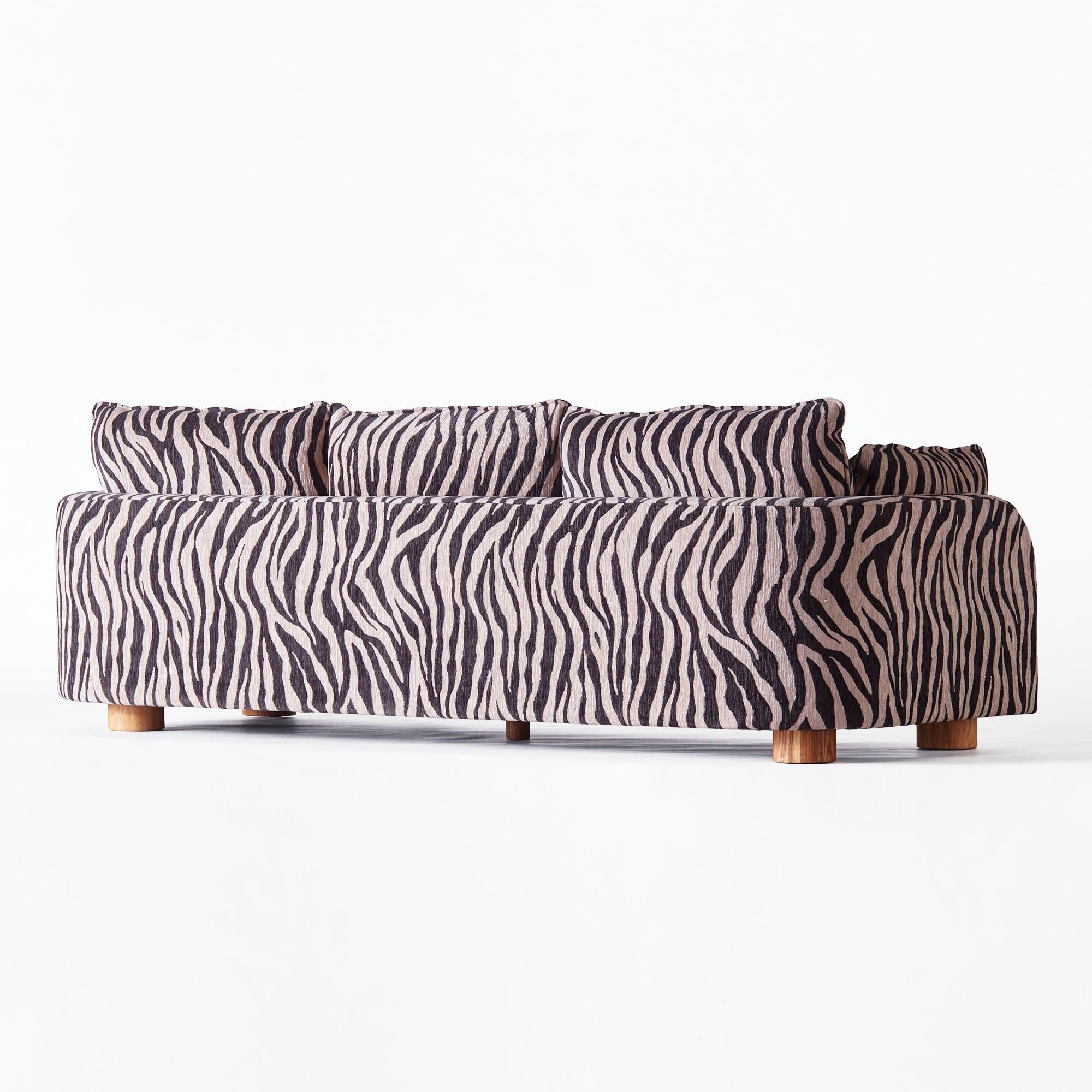 https://a.1stdibscdn.com/zebra-patterned-upholstered-sofa-model-miles-for-sale-picture-5/f_58912/f_442125521771246864094/DD_2303_PRODUCT_SOFA_MILES_ZEBRA_1618_1__master.jpg