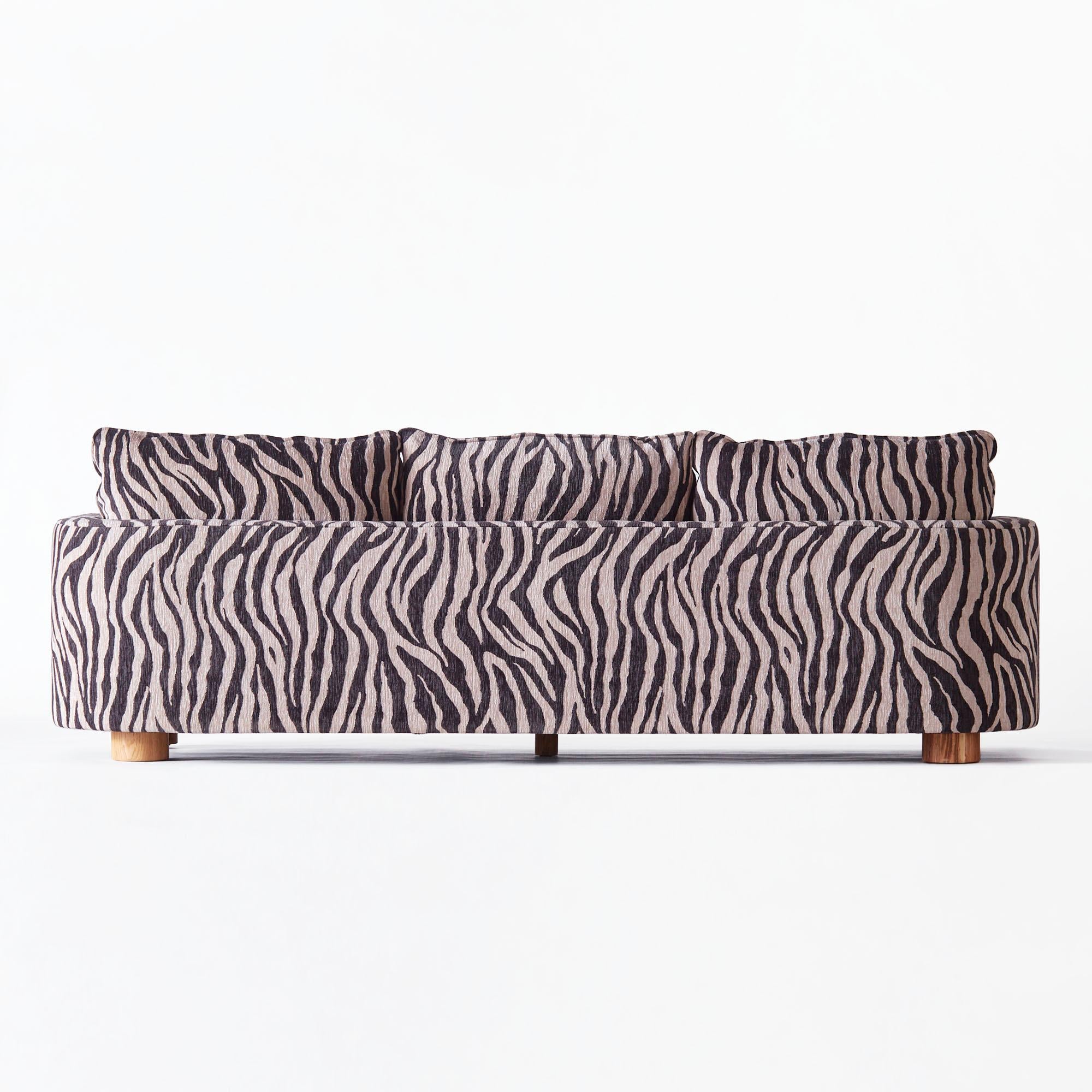 https://a.1stdibscdn.com/zebra-patterned-upholstered-sofa-model-miles-for-sale-picture-4/f_58912/f_442125521771246864827/DD_2303_PRODUCT_SOFA_MILES_ZEBRA_1620_1__master.jpg