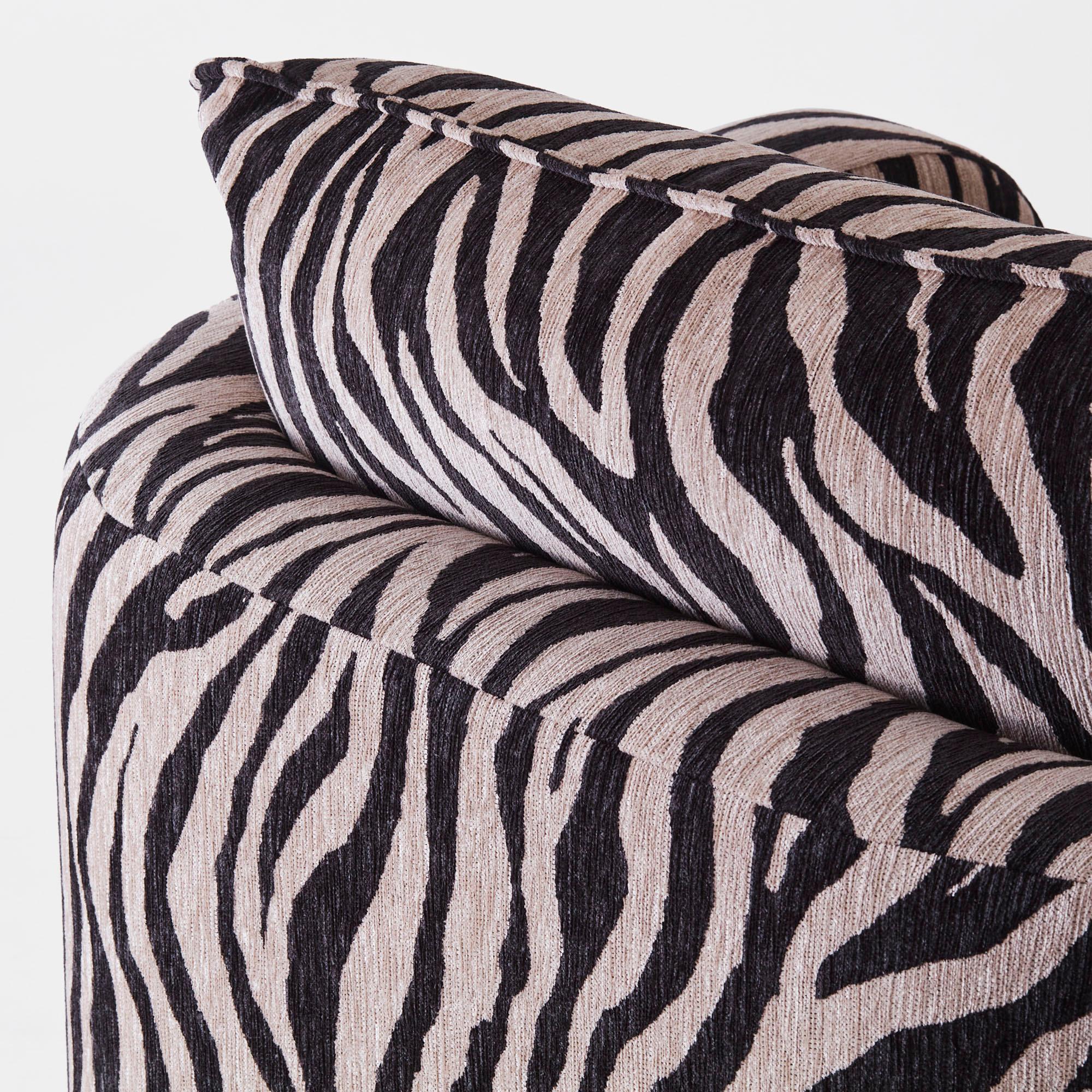 https://a.1stdibscdn.com/zebra-patterned-upholstered-armchair-model-miles-for-sale-picture-6/f_58912/f_488333421771257323825/DD_2311_PRODUCT_MILES_ARMCHAIR_ZEBRA_032_master.jpg