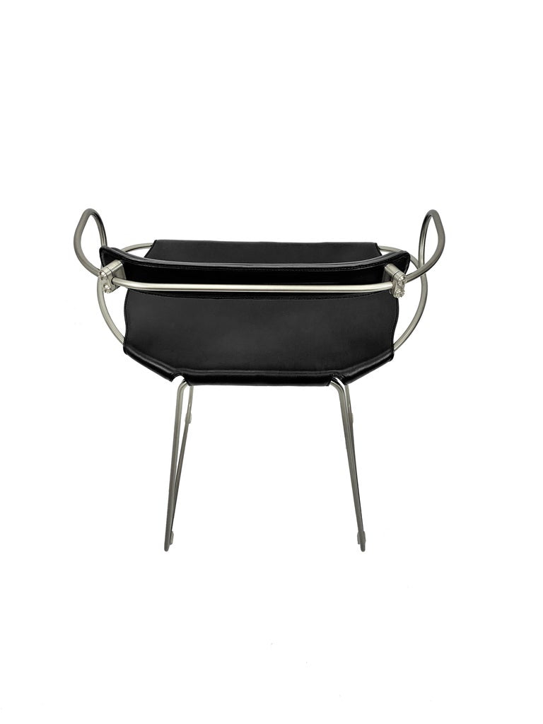 https://a.1stdibscdn.com/bar-stool-with-backrest-old-silver-steel-and-black-saddler-leather-for-sale-picture-4/f_40561/1583152703331/DETR_S_master.jpg?width=768