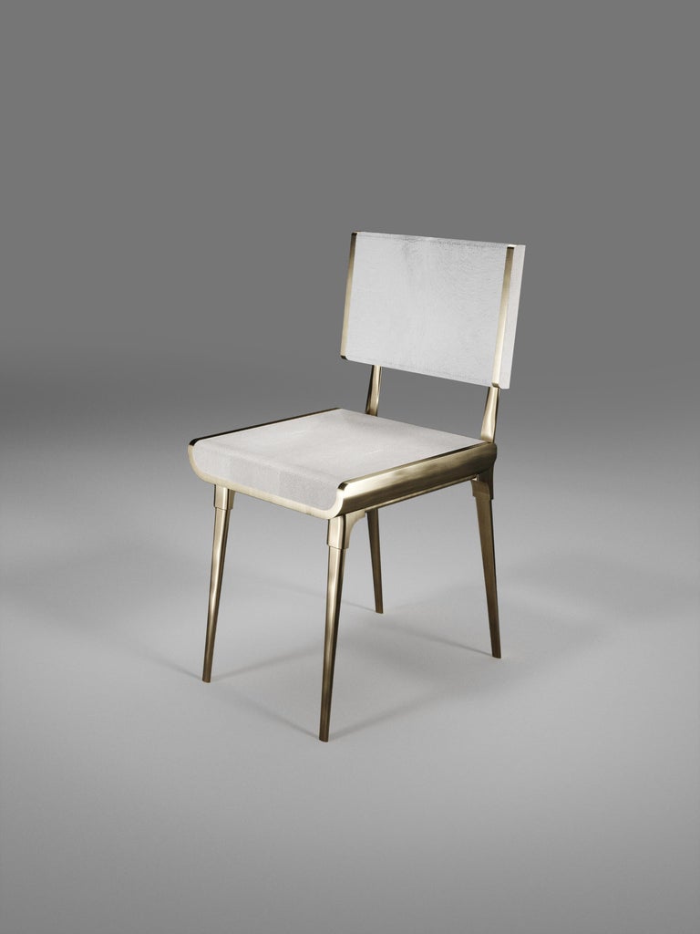 https://a.1stdibscdn.com/shagreen-chair-with-palmwood-and-bronze-patina-brass-details-by-kifu-paris-for-sale-picture-10/f_45491/f_241397321623489201645/DINING_OPT_010000_1_Re_cupe_re__master.jpg?width=768