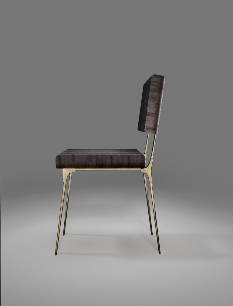 https://a.1stdibscdn.com/shagreen-chair-with-palmwood-and-bronze-patina-brass-details-by-kifu-paris-for-sale-picture-2/f_45491/f_241397321623489200622/DINING_OPT_010000_1_Re_cupe_re_f_master.jpg?width=768