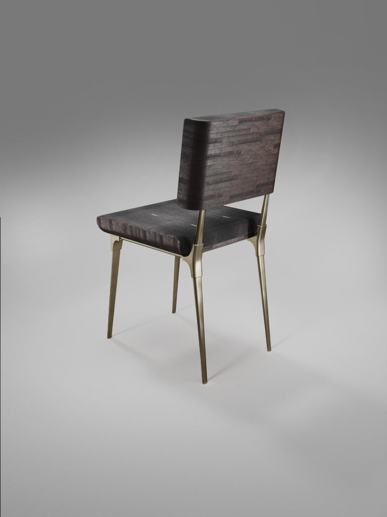 https://a.1stdibscdn.com/shagreen-chair-with-palmwood-and-bronze-patina-brass-details-by-kifu-paris-for-sale-picture-3/f_45491/f_241397321623489200909/DINING_OPT_010001_Re_cupe_re_Re_cupe_re__master.jpg?width=768