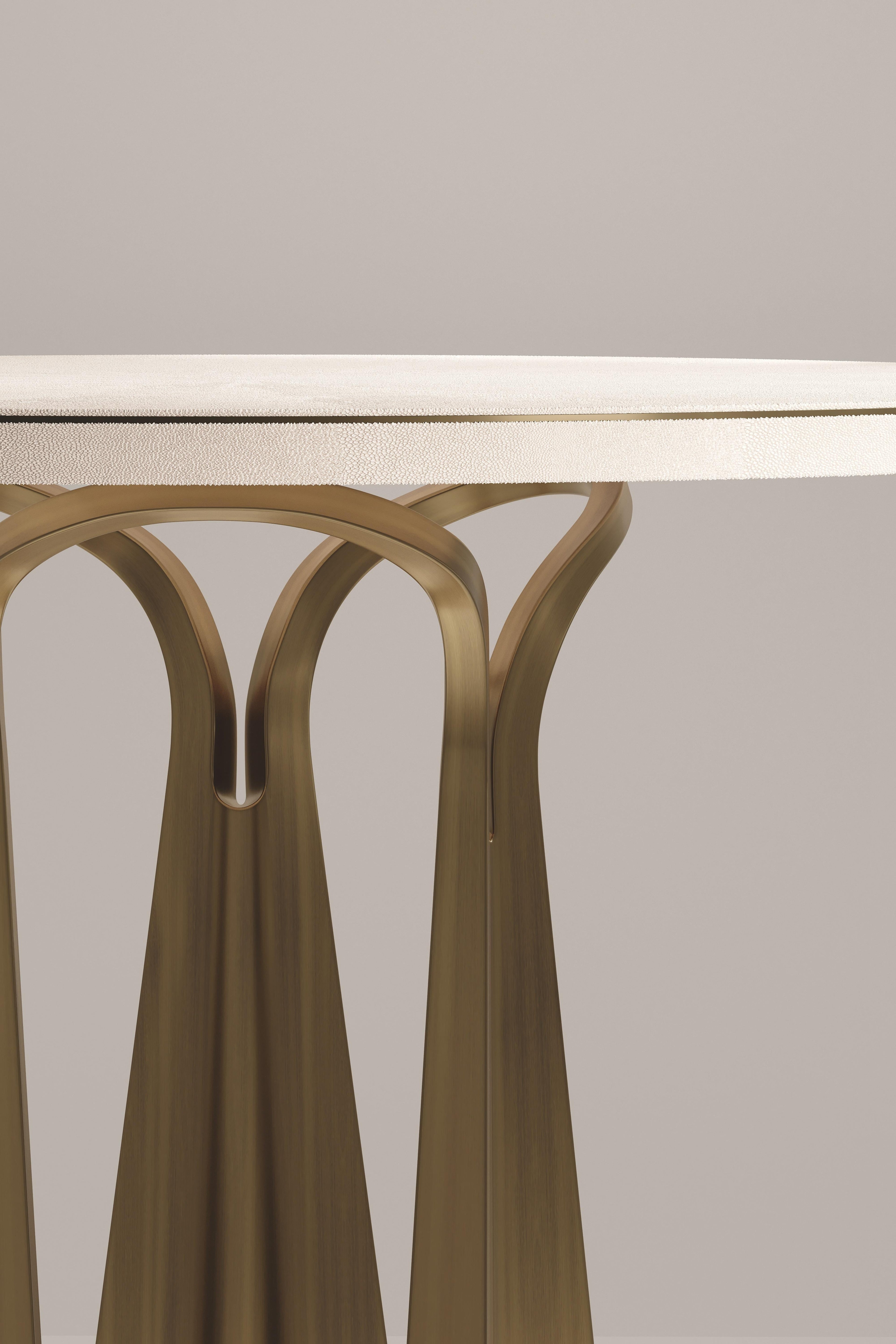 https://a.1stdibscdn.com/shagreen-breakfast-table-with-sculptural-brass-legs-by-ry-augousti-for-sale-picture-6/f_45491/f_402354921718761467168/DINING_TABLE0004_master.jpg
