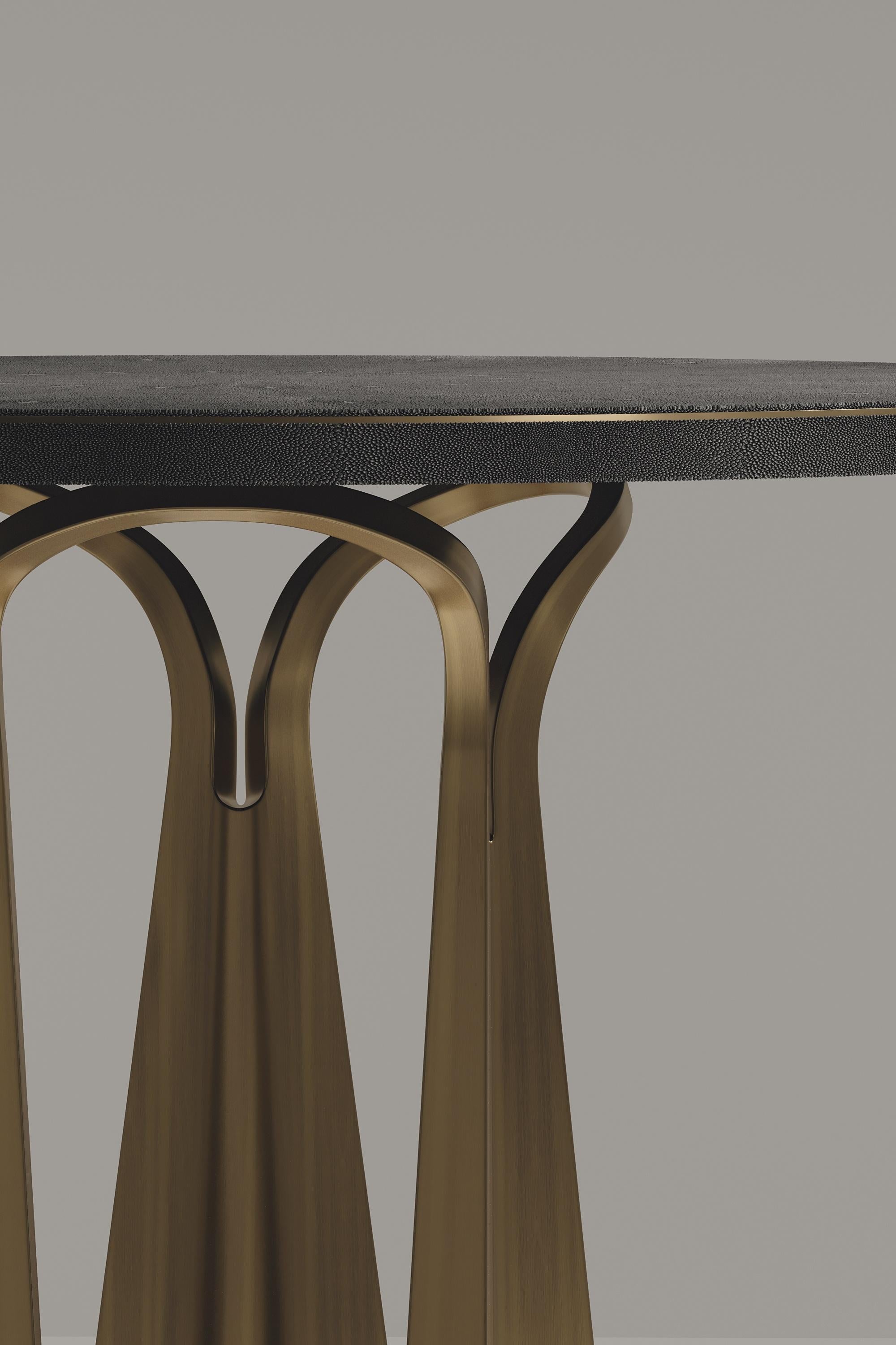 https://a.1stdibscdn.com/shagreen-breakfast-table-with-sculptural-brass-legs-by-ry-augousti-for-sale-picture-5/f_45491/f_402355421718761883853/DINING_TABLE0004_master.jpg
