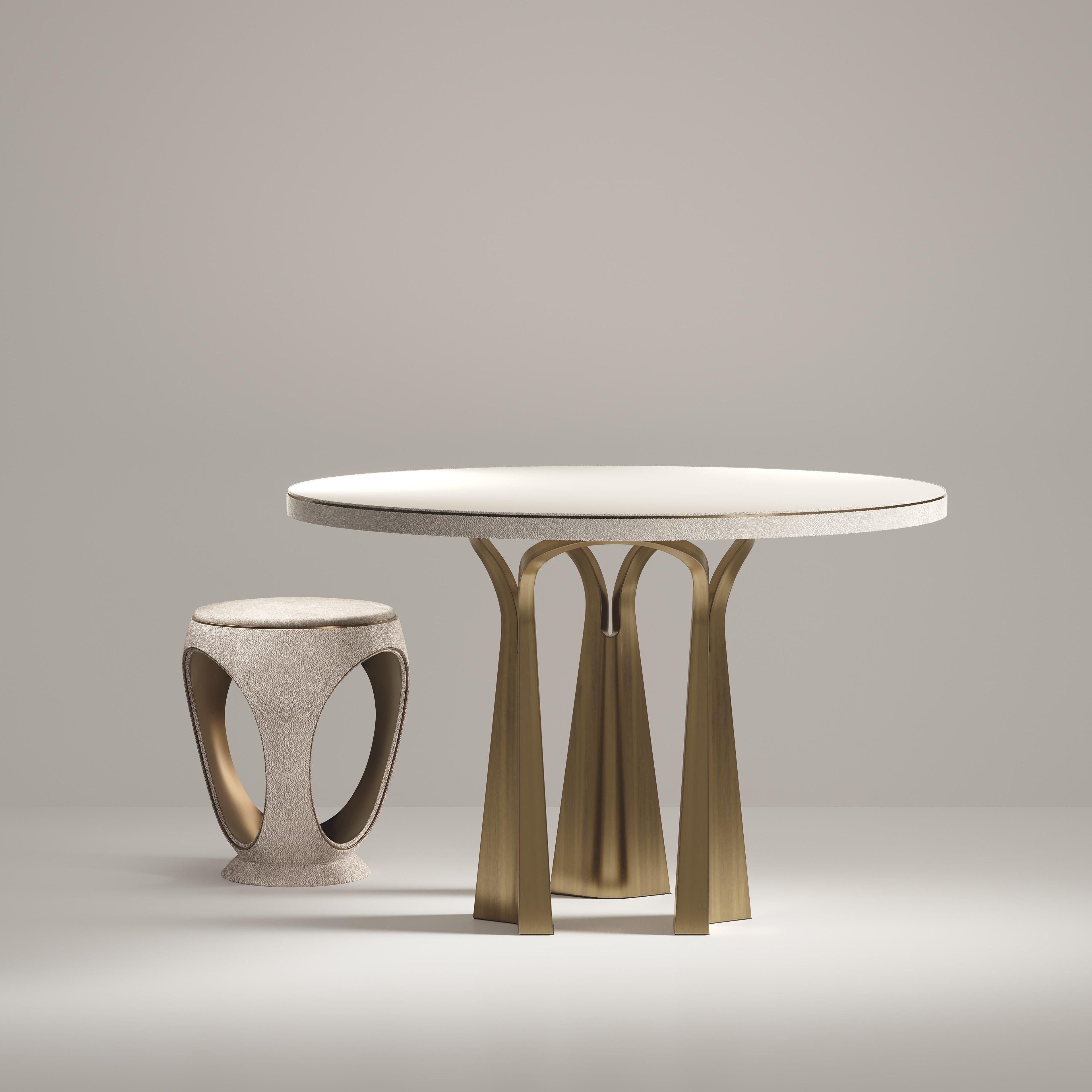 https://a.1stdibscdn.com/shagreen-breakfast-table-with-sculptural-brass-legs-by-ry-augousti-for-sale-picture-6/f_45491/f_402355421718761877141/DINING_TABLE_d1_master.jpg