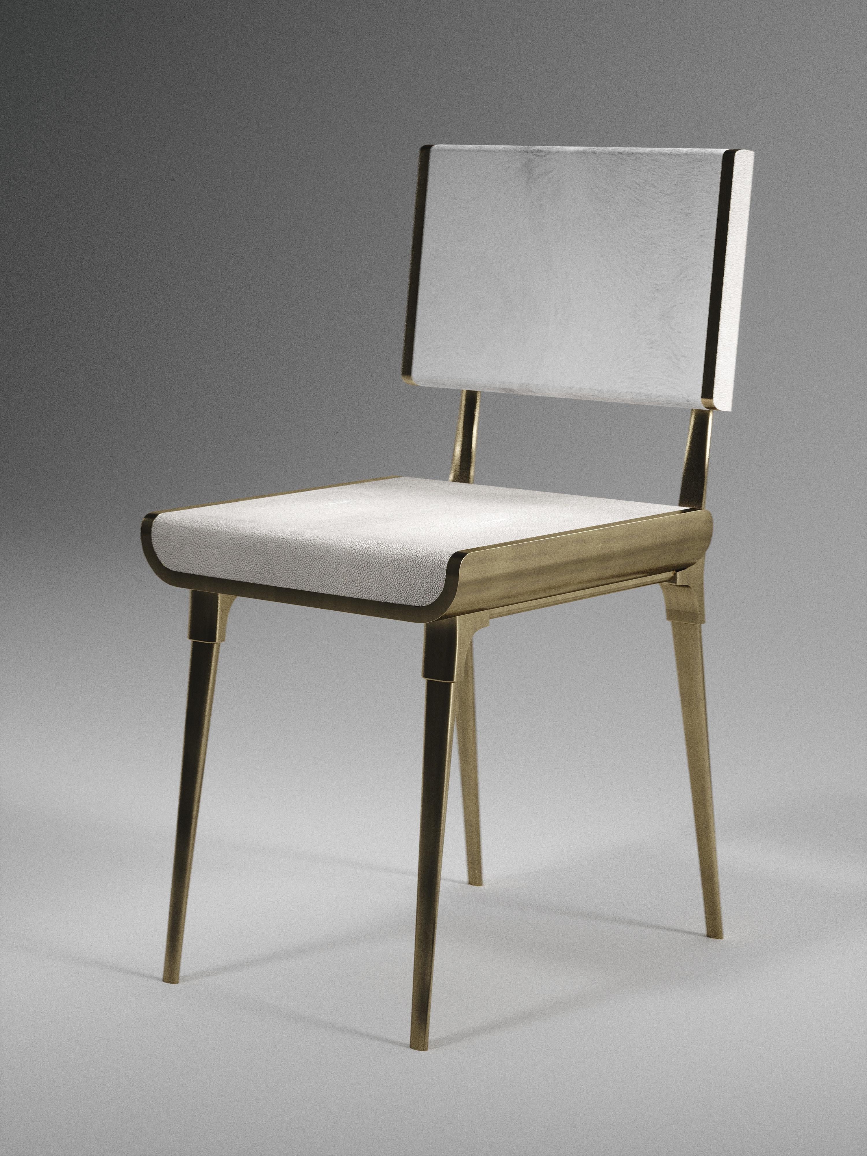 https://a.1stdibscdn.com/shagreen-dining-chair-with-bronze-patina-brass-details-by-kifu-paris-for-sale-picture-2/f_45491/f_240504521622883270541/DINING_V_D10006W_master.jpg