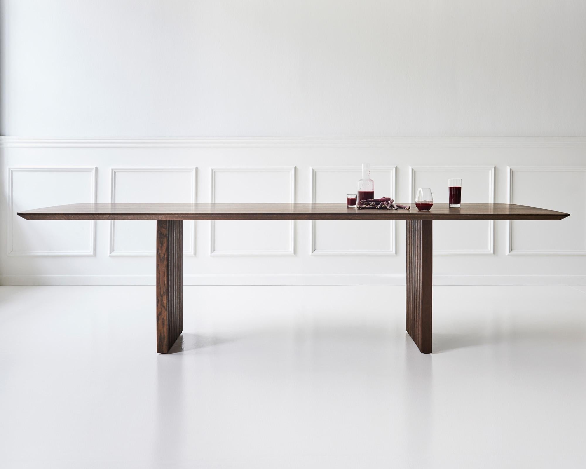https://a.1stdibscdn.com/customizable-dining-table-ten-340-smoked-oak-or-walnut-for-sale-picture-2/f_31233/f_278023421647363974684/DK3_TEN_Massive_table_Oak_2_master.jpg