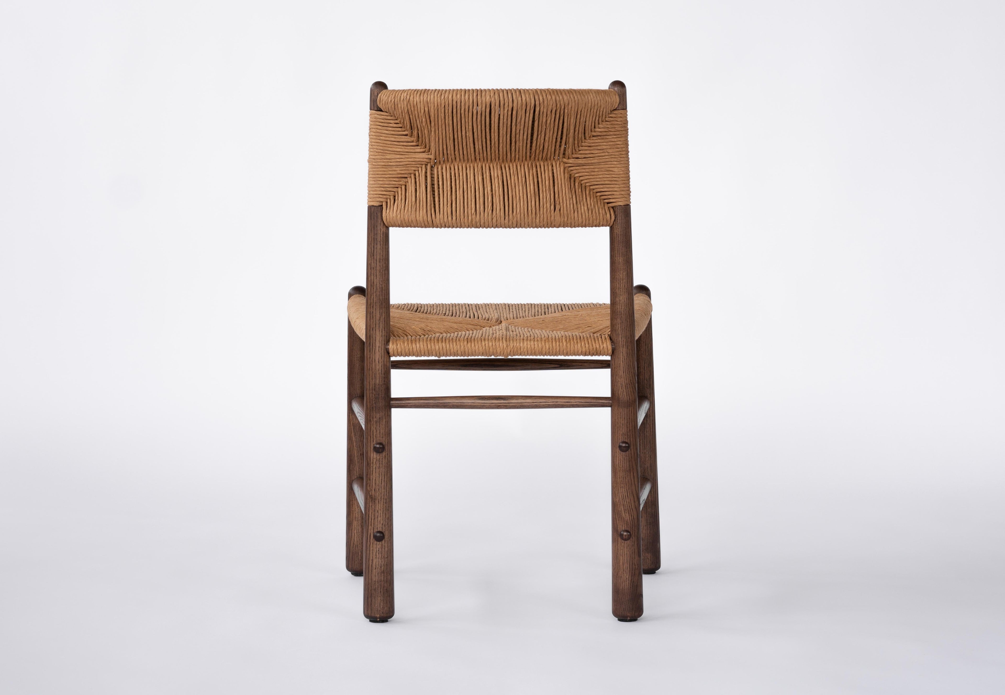 https://a.1stdibscdn.com/ewa-dining-chair-walnut-with-natural-fiber-rush-woven-seat-and-backrest-for-sale-picture-2/f_26683/f_346922321686330377708/DSC00002_master.jpg