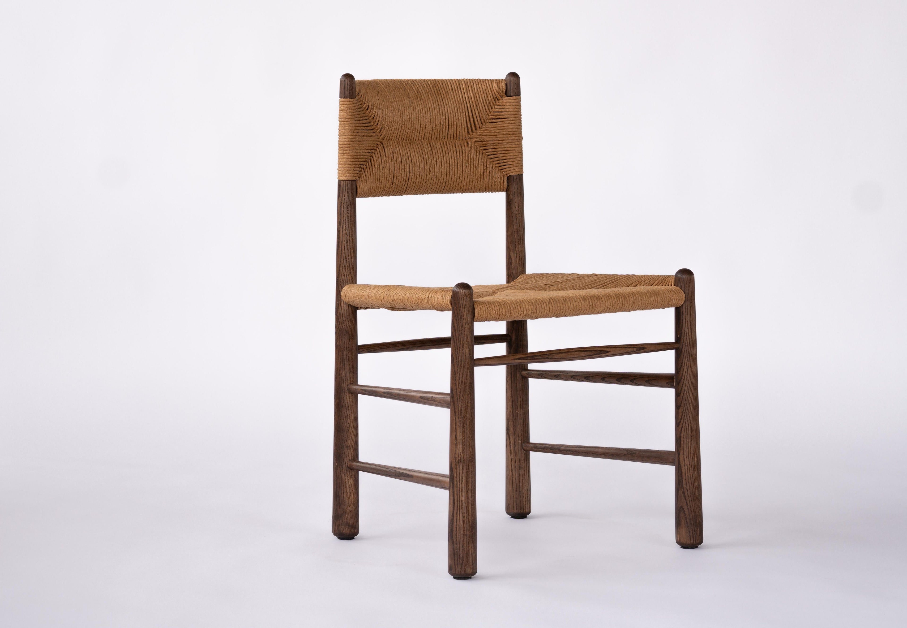 https://a.1stdibscdn.com/ewa-dining-chair-walnut-with-natural-fiber-rush-woven-seat-and-backrest-for-sale-picture-3/f_26683/f_346922321686330375391/DSC00007_master.jpg
