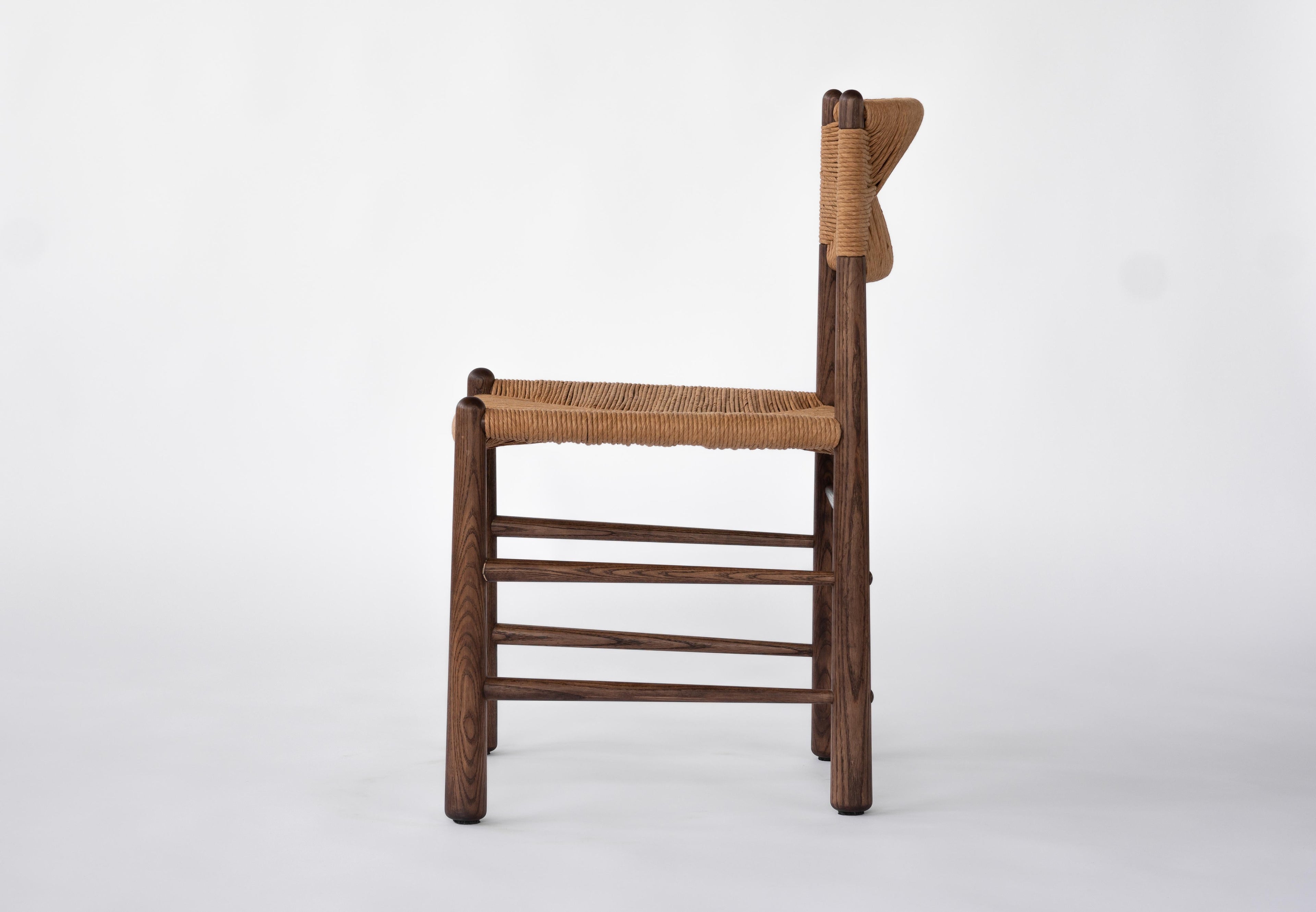 https://a.1stdibscdn.com/ewa-dining-chair-walnut-with-natural-fiber-rush-woven-seat-and-backrest-for-sale-picture-5/f_26683/f_346922321686330377204/DSC00011_master.jpg
