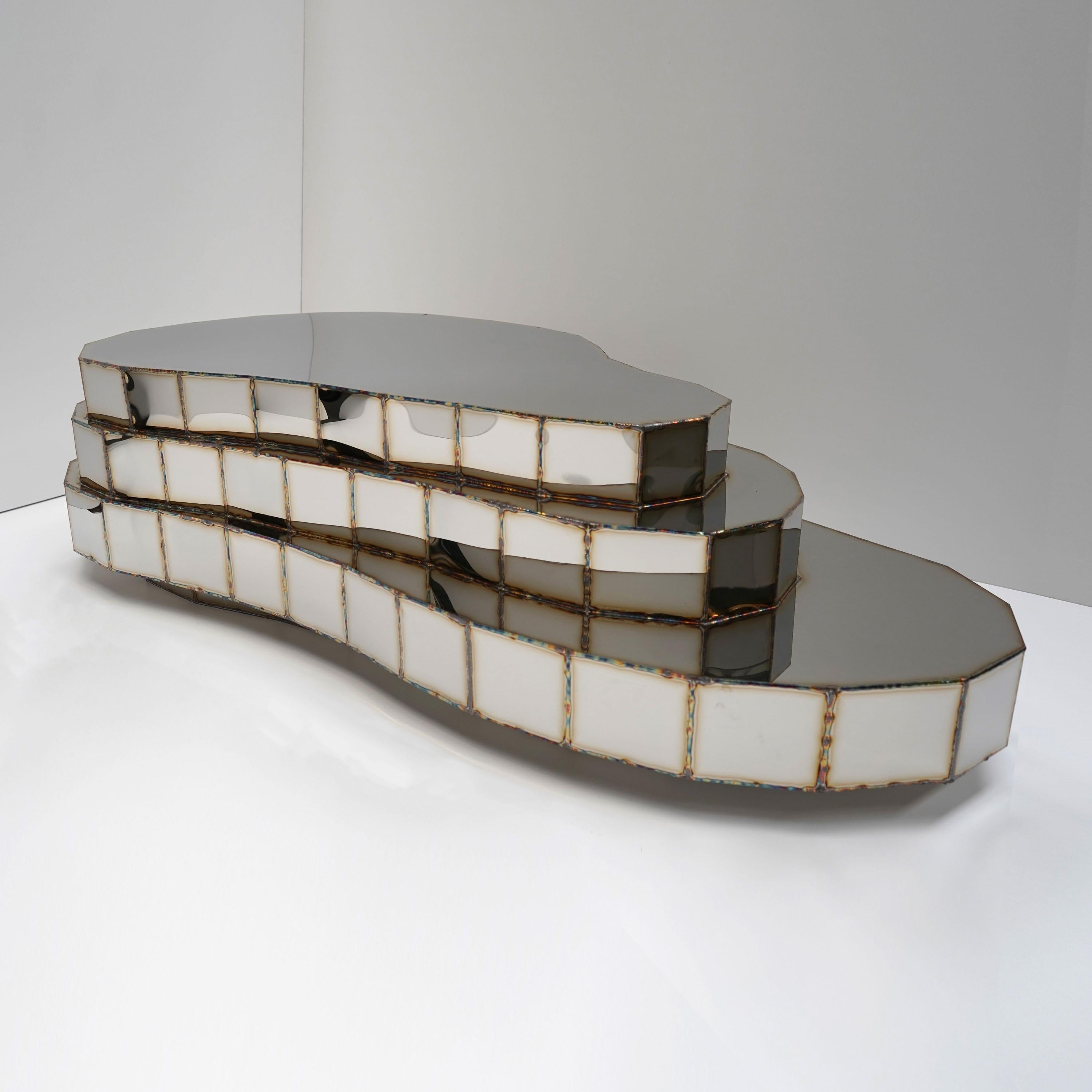 https://a.1stdibscdn.com/steppe-low-table-in-welded-mirror-polished-stainless-steel-by-julian-mayor-for-sale-picture-2/f_12192/f_459856521753281633423/DSC01407_edit_master.jpg