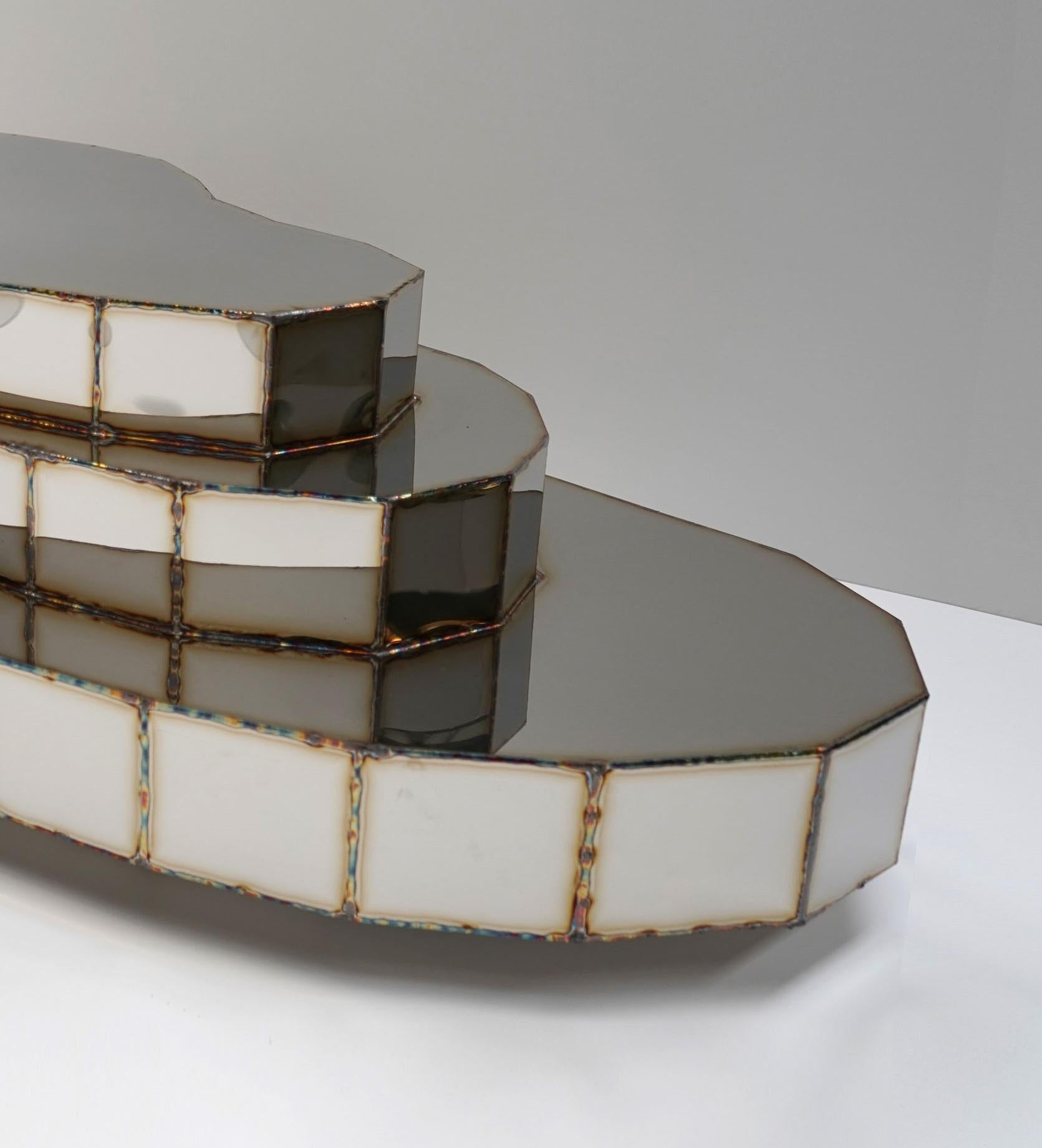https://a.1stdibscdn.com/steppe-low-table-in-welded-mirror-polished-stainless-steel-by-julian-mayor-for-sale-picture-3/f_12192/f_459856521753281633365/DSC01407_edita_master.jpg