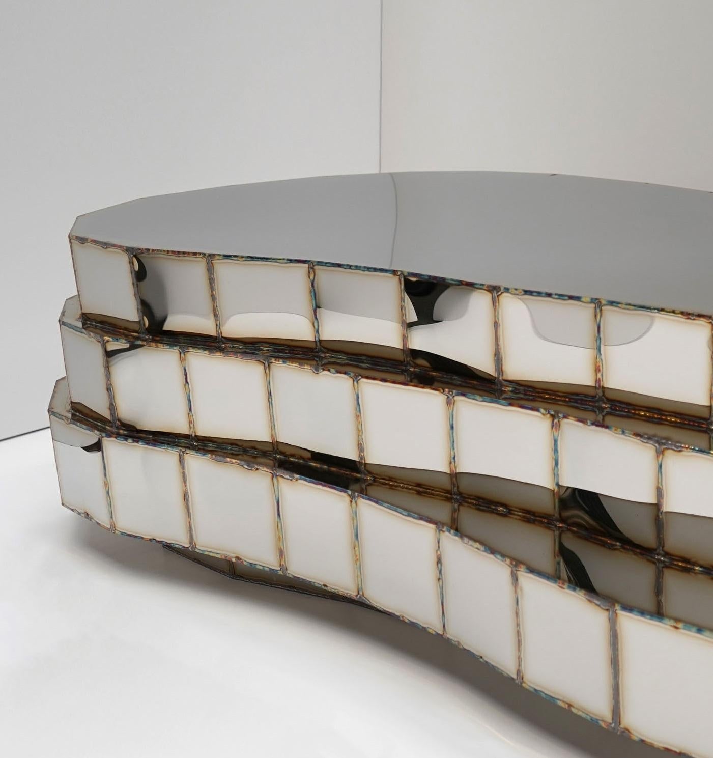https://a.1stdibscdn.com/steppe-low-table-in-welded-mirror-polished-stainless-steel-by-julian-mayor-for-sale-picture-4/f_12192/f_459856521753281633378/DSC01407_editaa_master.jpg