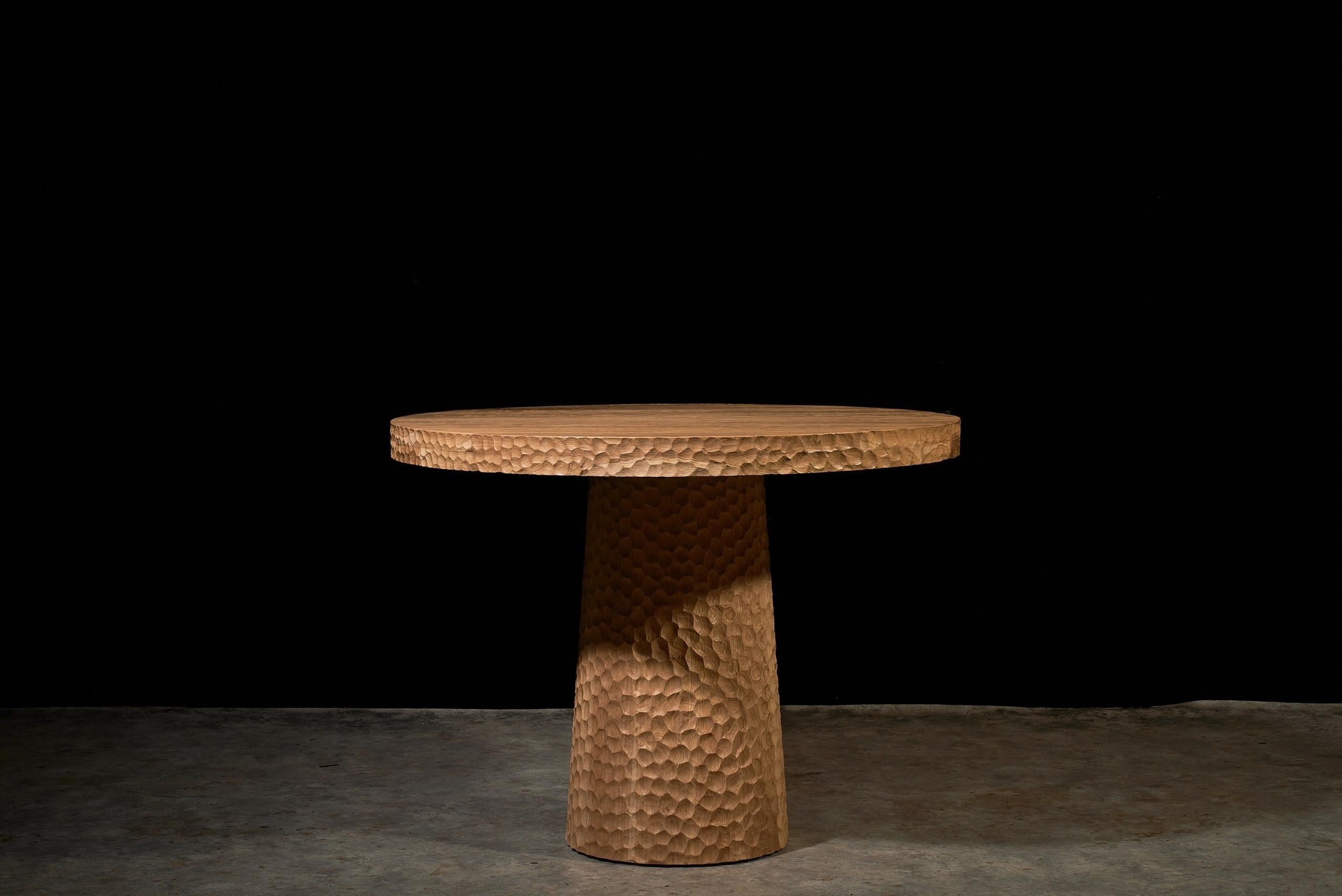 https://a.1stdibscdn.com/round-oak-dining-table-120-cm-with-hand-carved-texture-and-cone-base-for-sale-picture-4/f_99712/f_451787021748211743789/DSC04182boyarshinov_a_resized_master.jpg