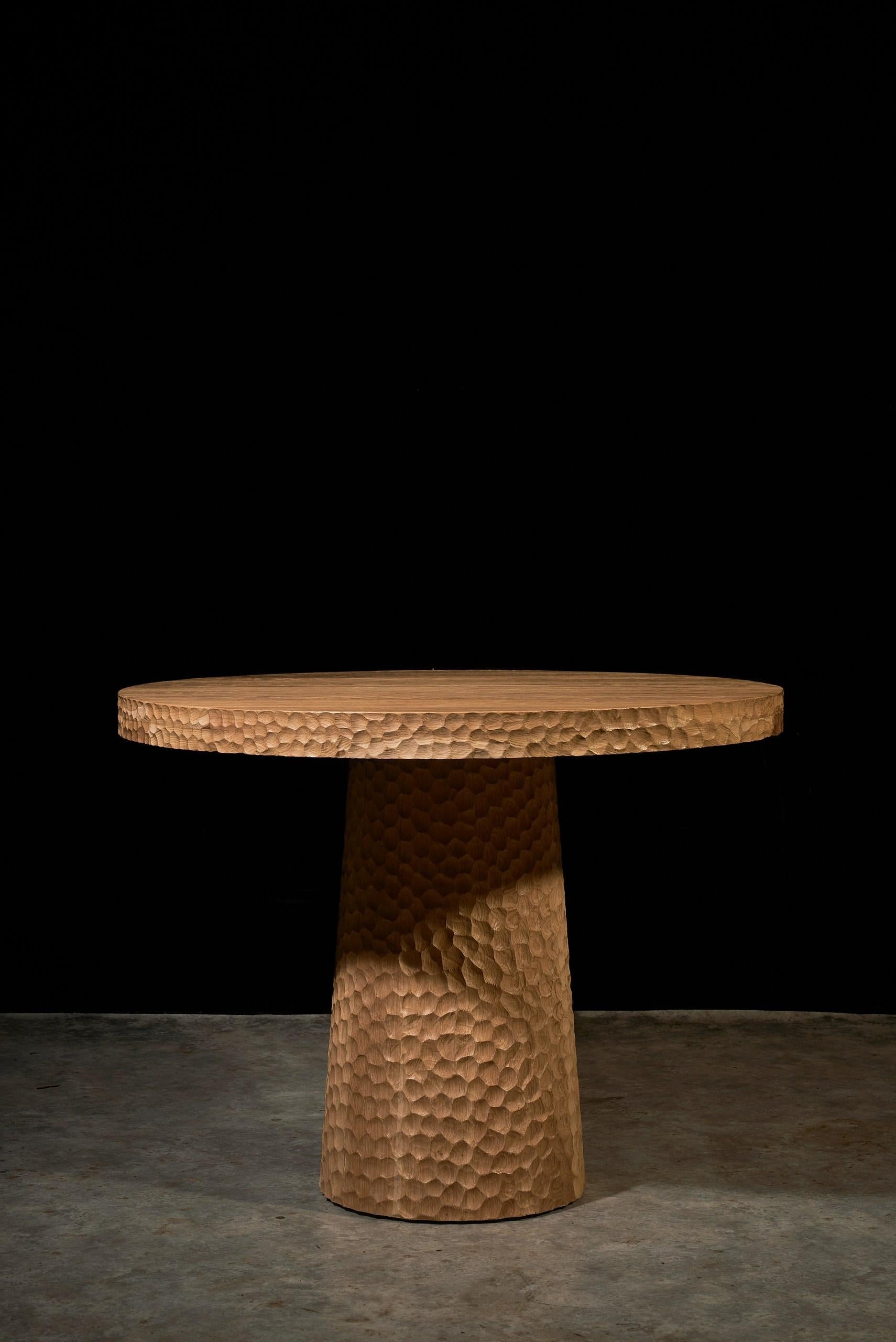 https://a.1stdibscdn.com/round-oak-dining-table-100-cm-with-hand-carved-texture-and-cone-base-for-sale-picture-4/f_99712/f_451751321748150806708/DSC04185boyarshinov_a_resized_master.jpg