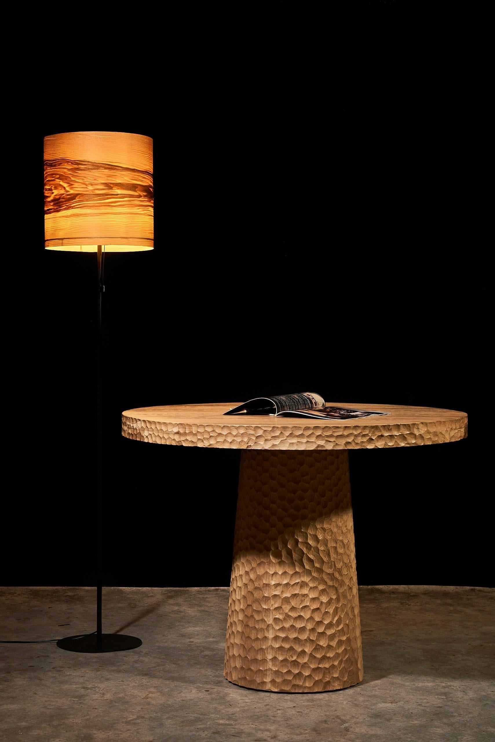 https://a.1stdibscdn.com/round-oak-dining-table-100-cm-with-hand-carved-texture-and-cone-base-for-sale-picture-2/f_99712/f_451751321748150808138/DSC04200boyarshinov_a_resized_master.jpg