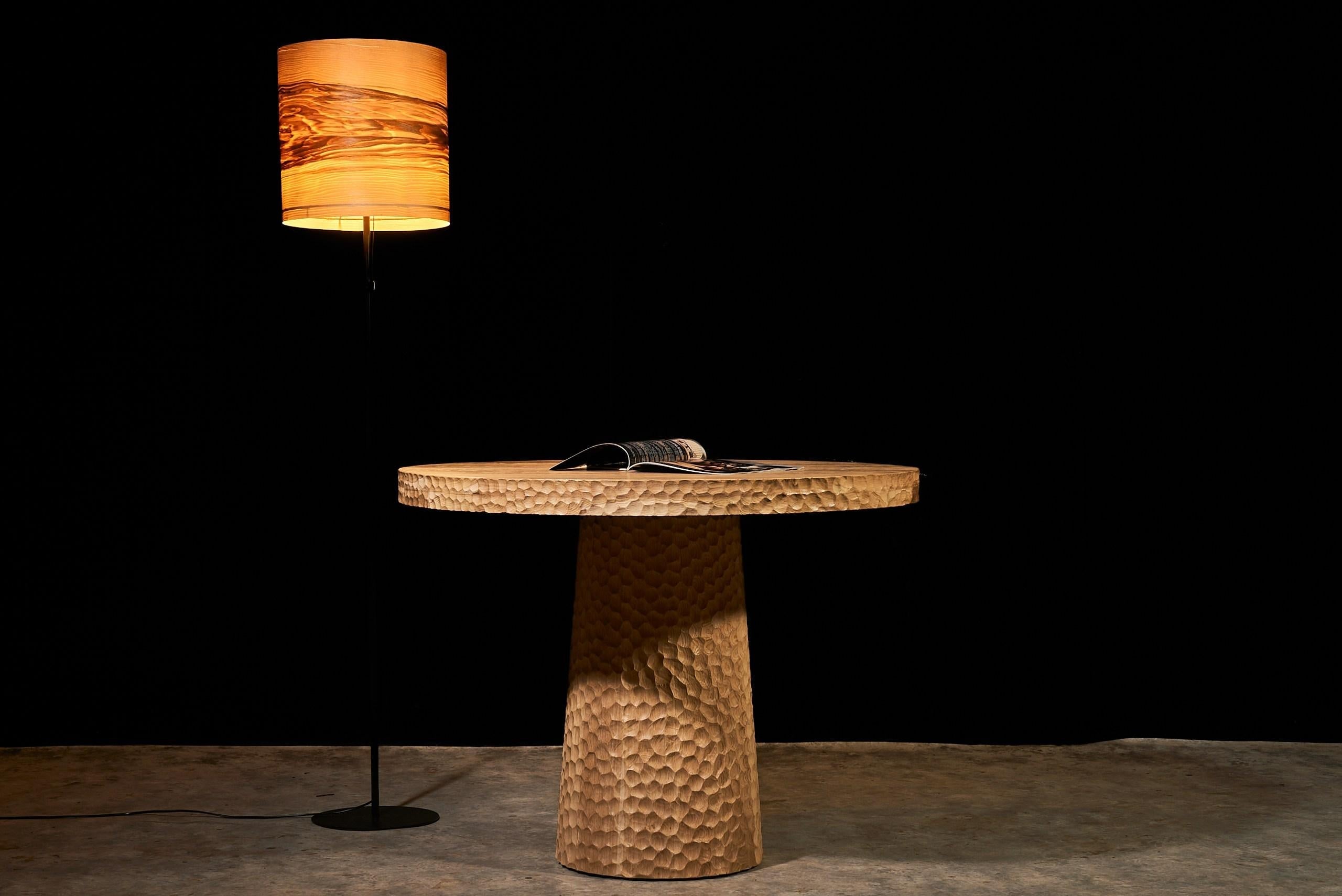 https://a.1stdibscdn.com/round-oak-dining-table-100-cm-with-hand-carved-texture-and-cone-base-for-sale-picture-6/f_99712/f_451751321748150808082/DSC04201boyarshinov_a_resized_master.jpg