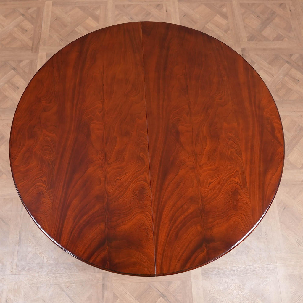 https://a.1stdibscdn.com/round-table-with-empire-bases-60-115-inch-for-sale-picture-7/f_85472/f_350299921741117201240/DSC04437_master.jpeg