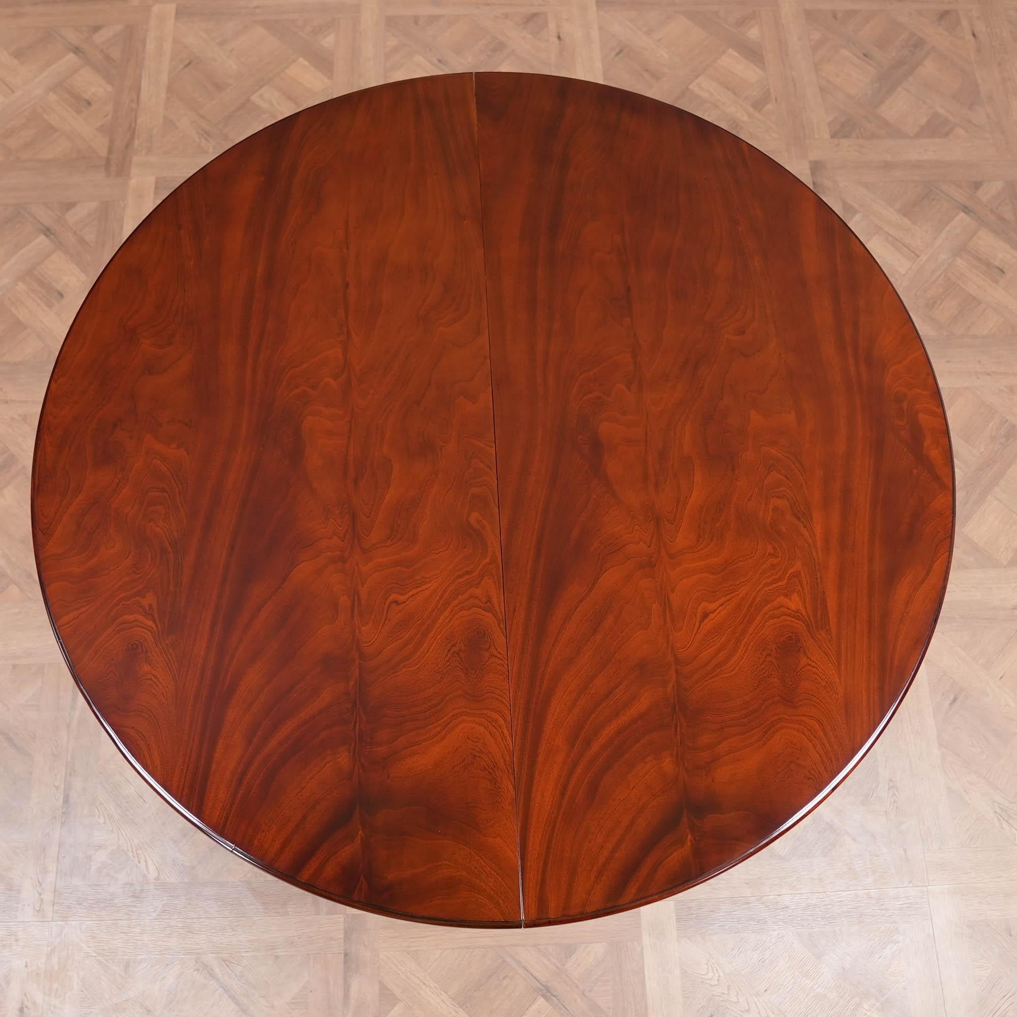 https://a.1stdibscdn.com/round-table-with-empire-bases-60-115-inch-for-sale-picture-7/f_85472/f_350299921741117201240/DSC04437_master.jpeg