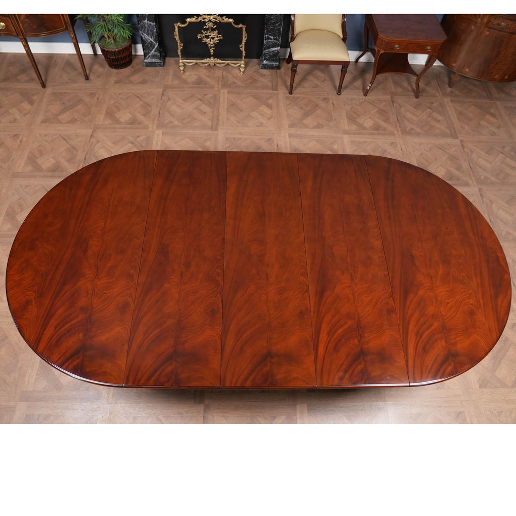 https://a.1stdibscdn.com/round-table-with-empire-bases-60-115-inch-for-sale-picture-10/f_85472/f_350299921741117201366/DSC04444_master.jpeg