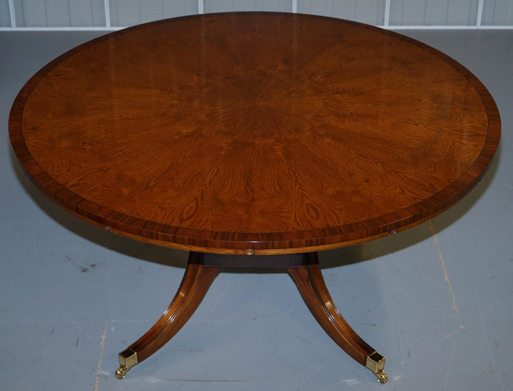 https://a.1stdibscdn.com/brand-new-cluster-oak-extending-jupe-round-dining-tables-seats-6-12-people-for-sale-picture-2/f_28233/f_189865521588878917017/DSC06023_master.JPG