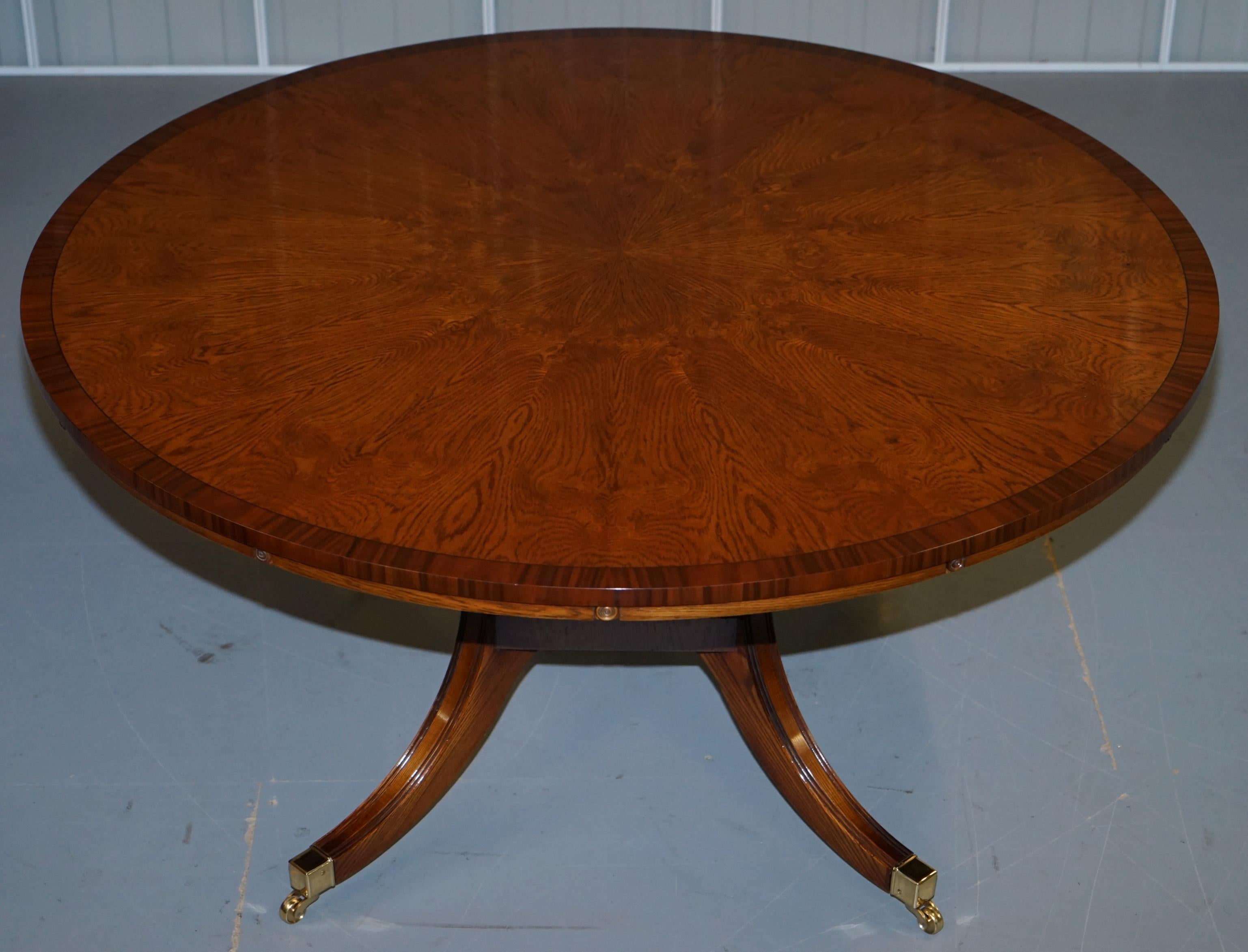 https://a.1stdibscdn.com/brand-new-cluster-oak-extending-jupe-round-dining-tables-seats-6-12-people-for-sale-picture-2/f_28233/f_189865521588878917017/DSC06023_master.JPG