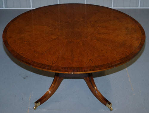 https://a.1stdibscdn.com/brand-new-cluster-oak-extending-jupe-round-dining-tables-seats-6-12-people-for-sale-picture-2/f_28233/f_189865521588878917017/DSC06023_master.JPG