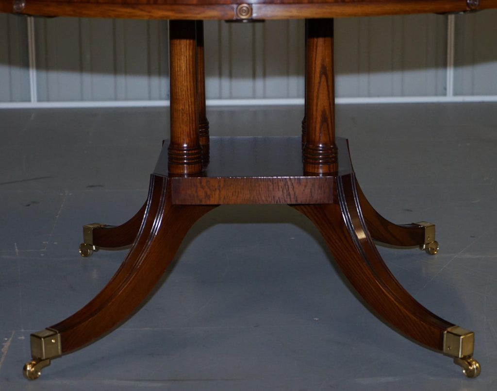 https://a.1stdibscdn.com/brand-new-cluster-oak-extending-jupe-round-dining-tables-seats-6-12-people-for-sale-picture-3/f_28233/f_189865521588878918497/DSC06028_master.JPG