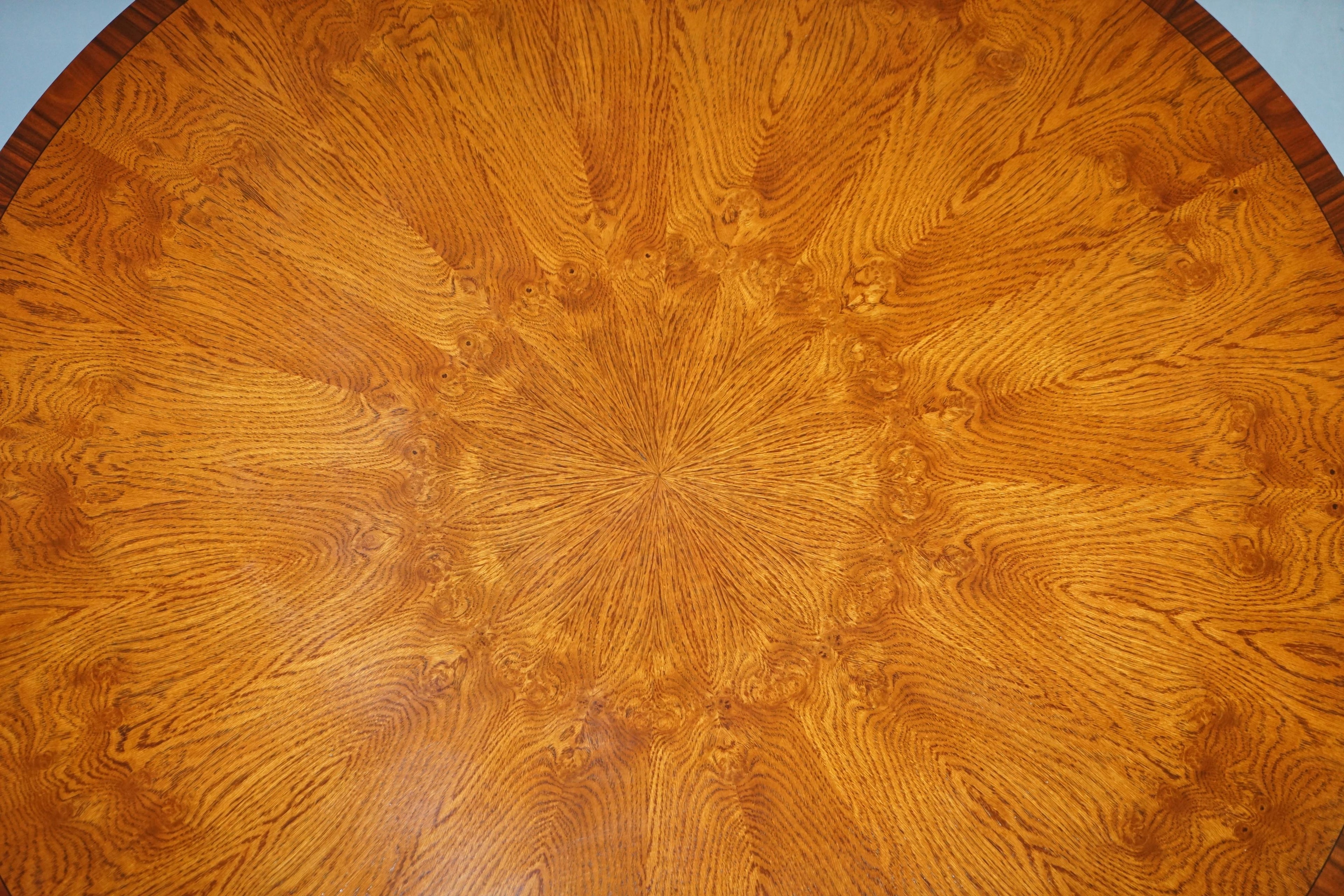 https://a.1stdibscdn.com/brand-new-cluster-oak-extending-jupe-round-dining-tables-seats-6-12-people-for-sale-picture-6/f_28233/f_189865521588878924763/DSC06039_master.JPG